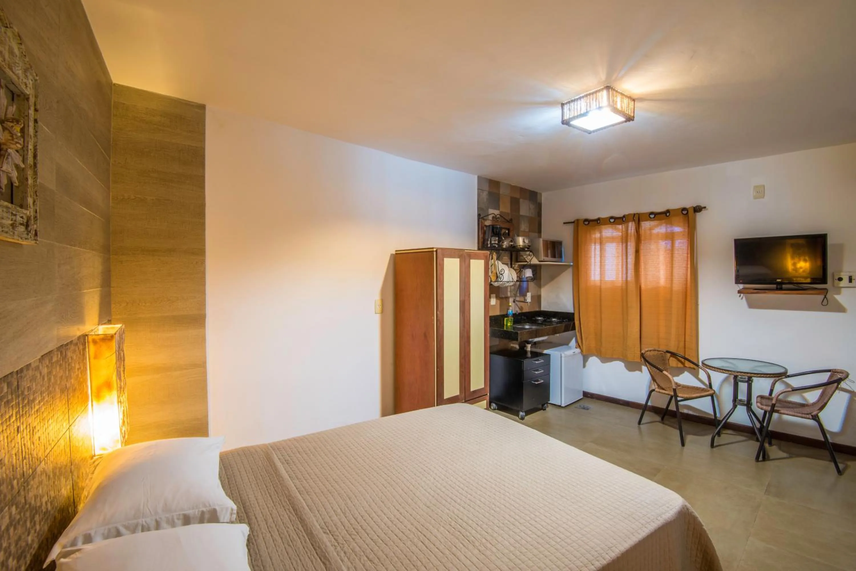 Kitchen or kitchenette, Bed in Pousada Ilha da Saudade