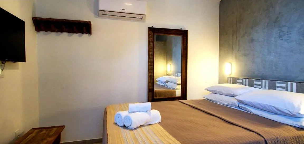 Bed in Pousada Ilha da Saudade