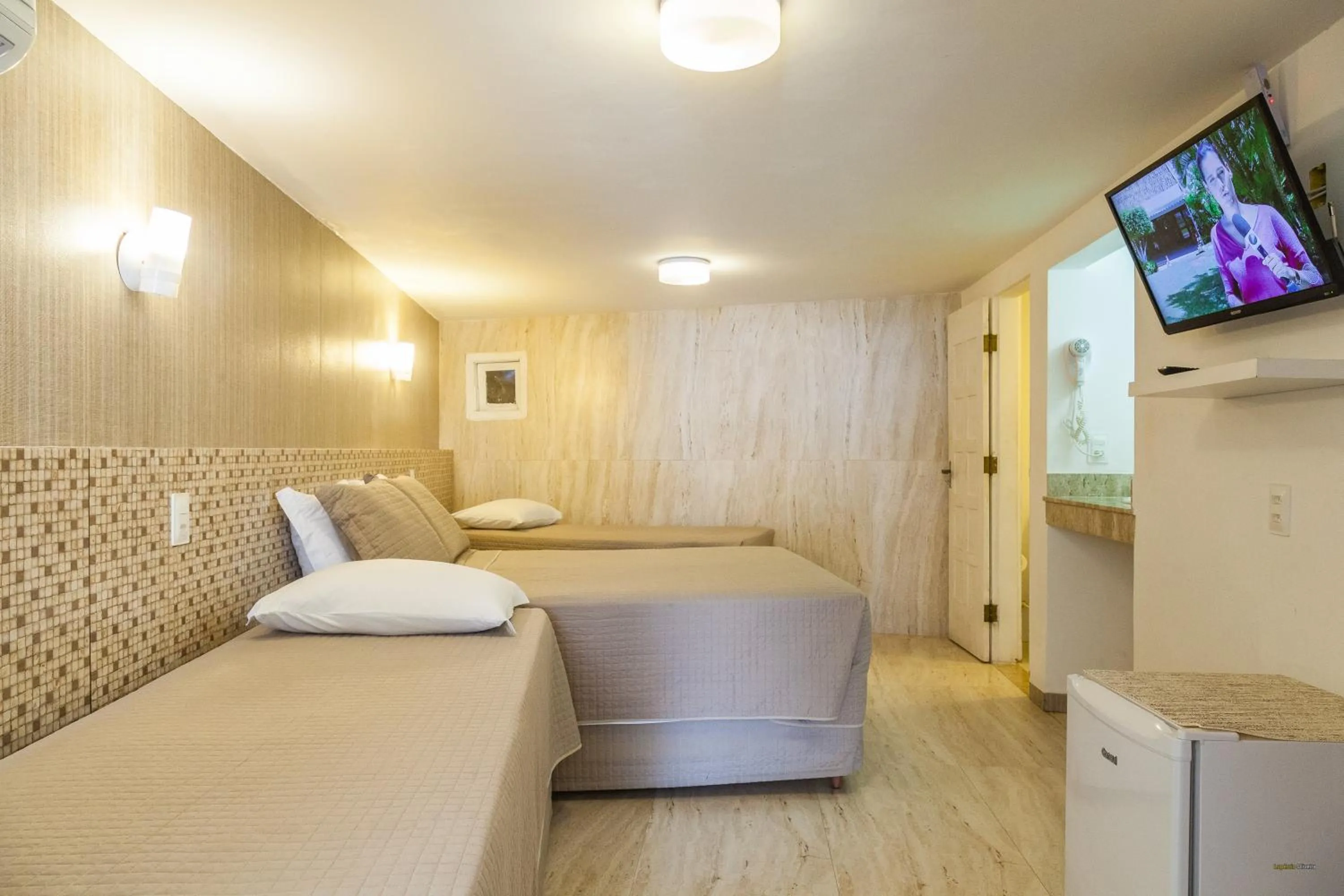 Bed in Pousada Ilha da Saudade