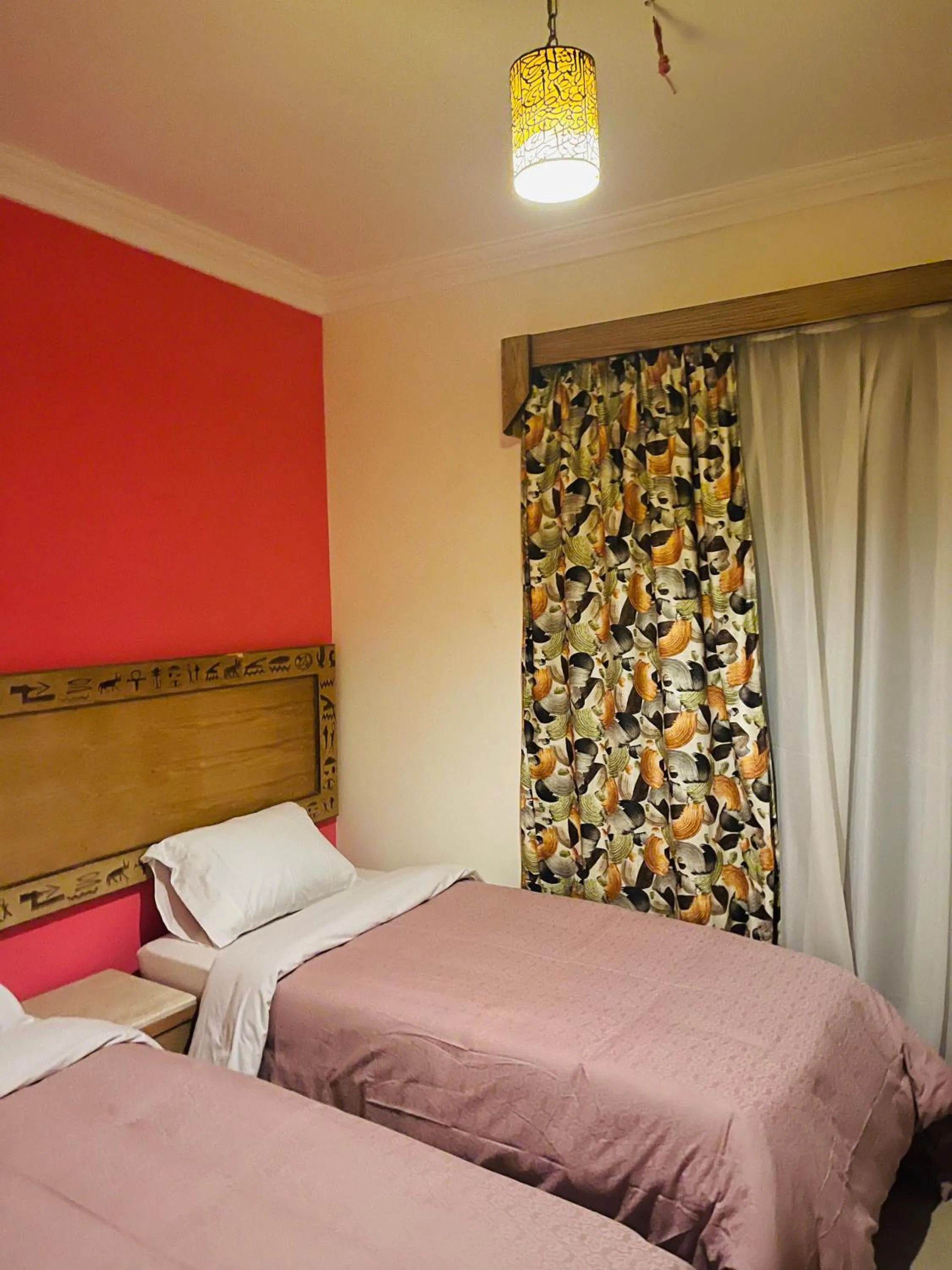 Bed in Jewel Howard Carter Hotel