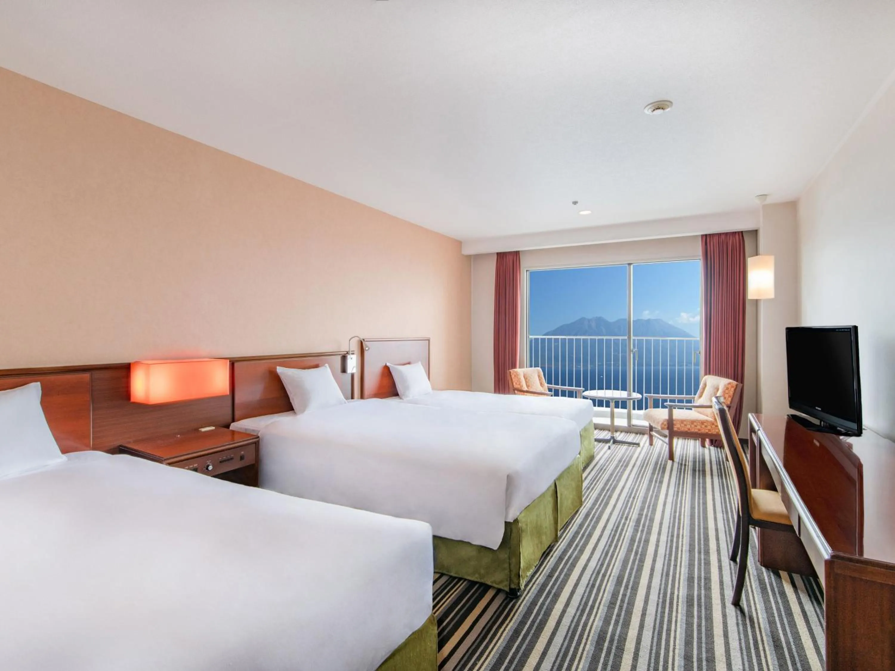 Photo of the whole room, Bed in Art Hotel Kagoshima