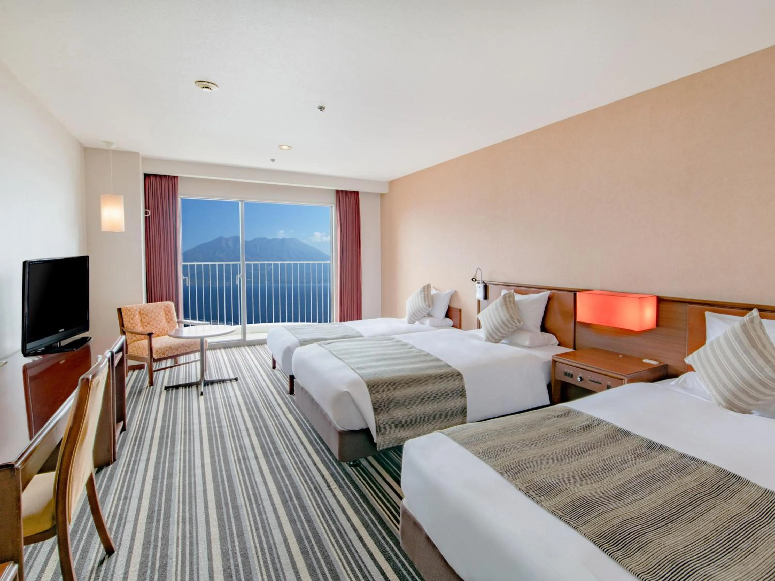 Photo of the whole room, Bed in Art Hotel Kagoshima