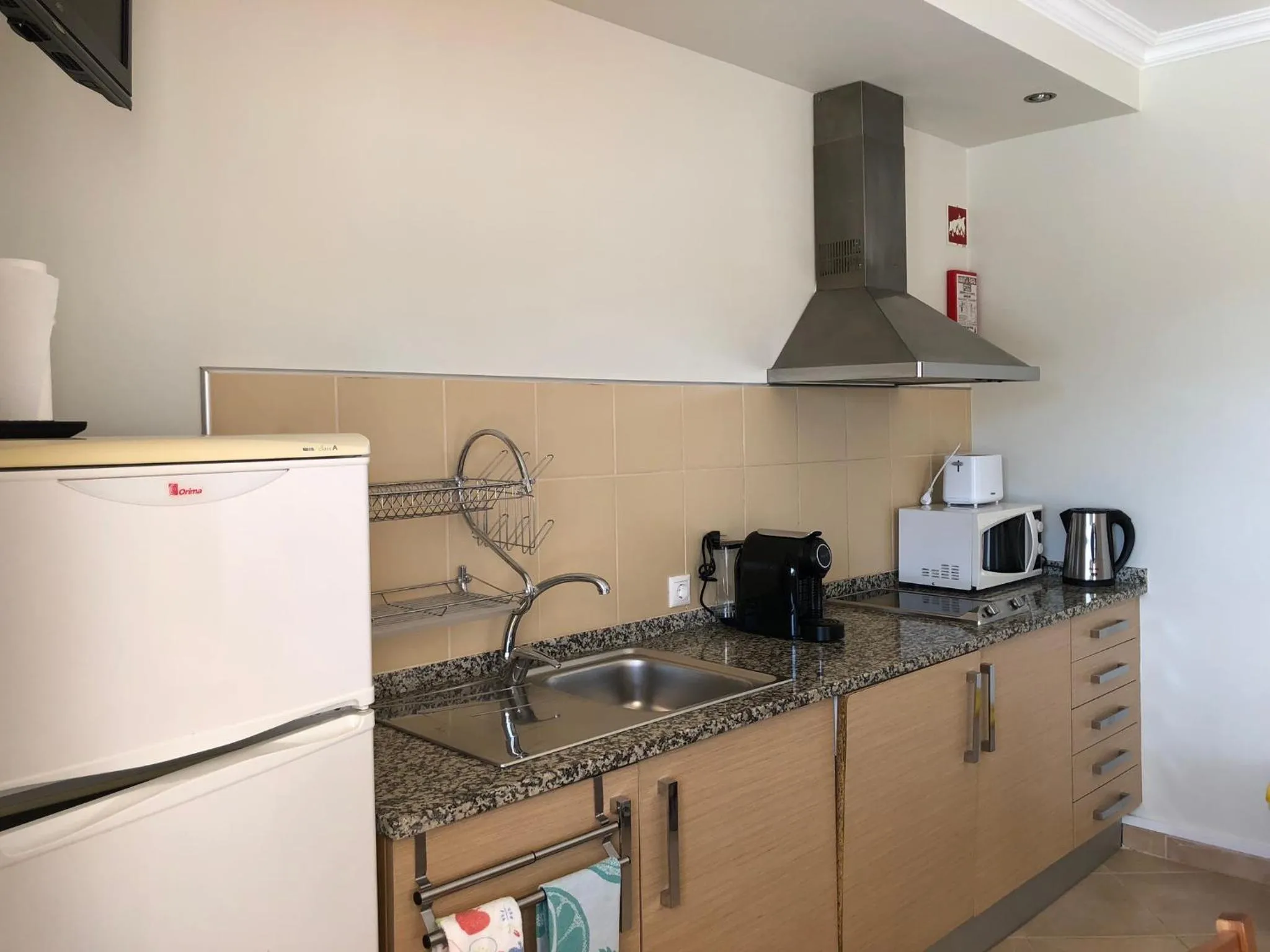 Kitchen or kitchenette in Villa vista mar e piscina