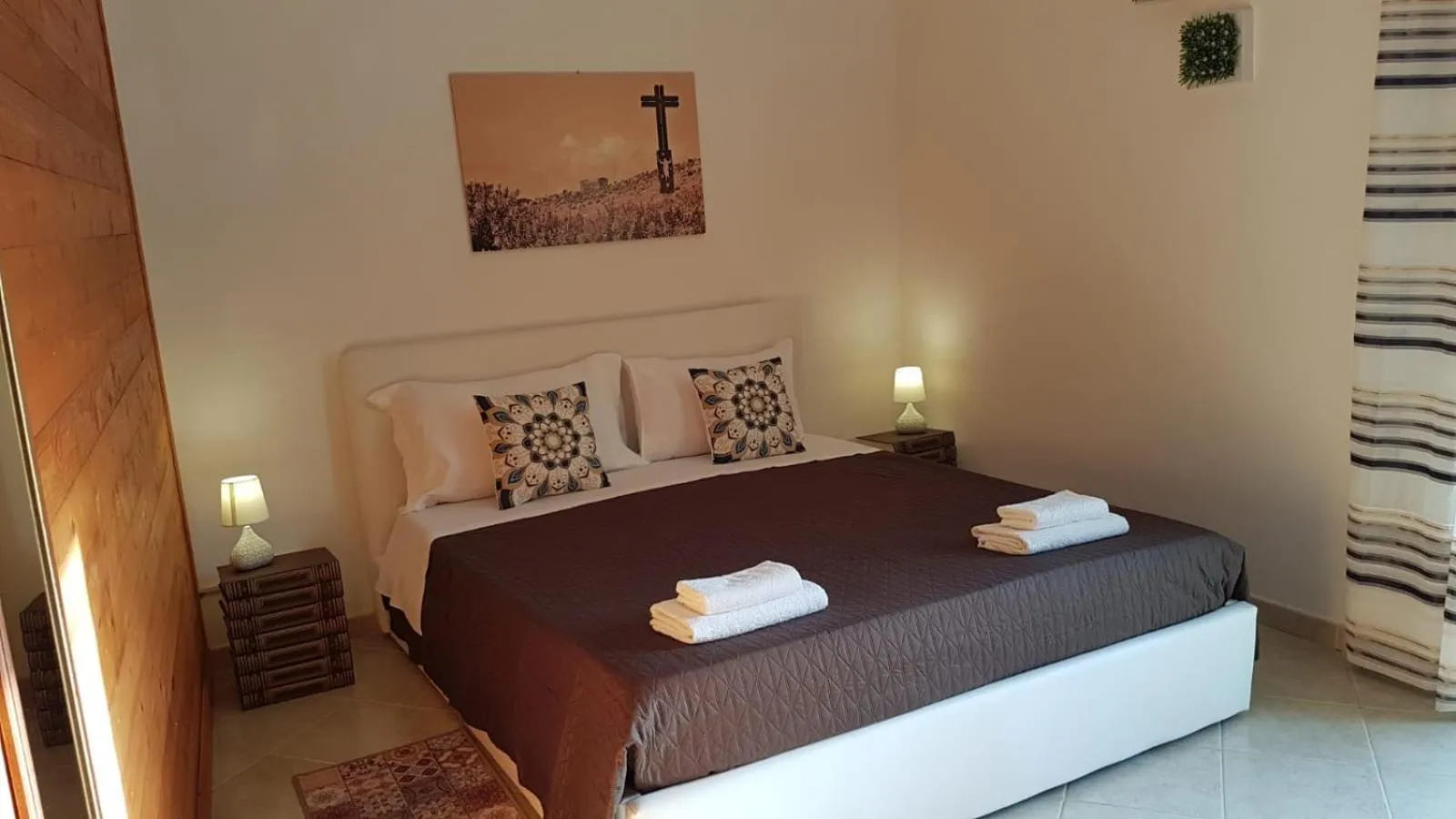 Photo of the whole room, Bed in Le Terrazze di Pirandello