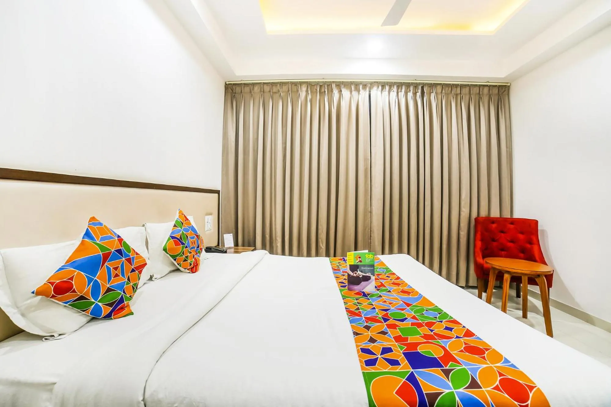 Bed in FabHotel Prime Sapphire Inn