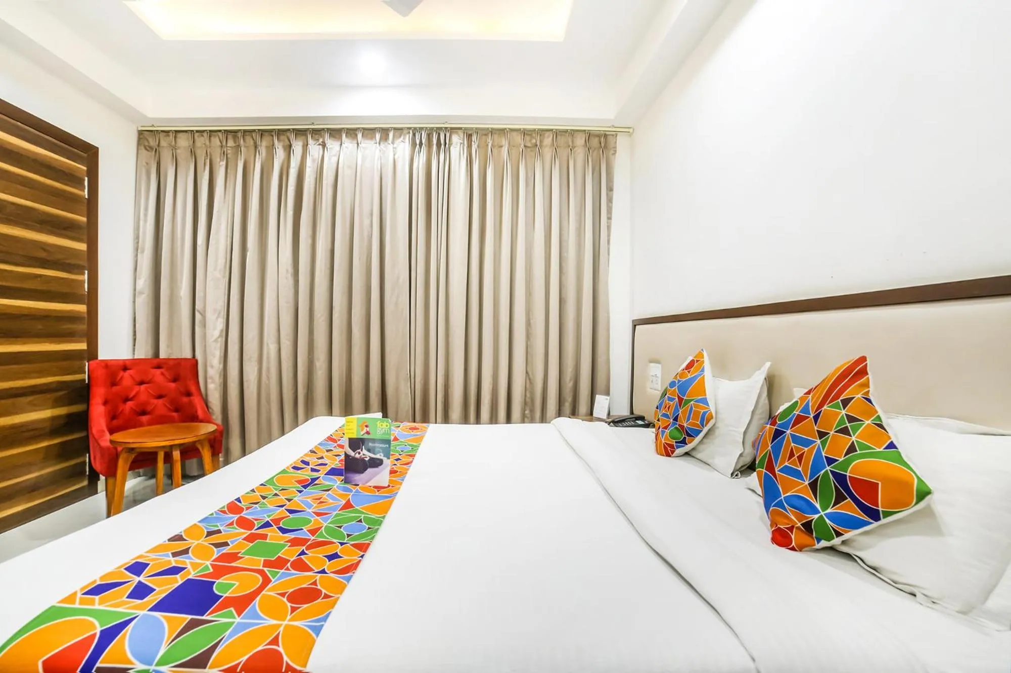 Bed in FabHotel Prime Sapphire Inn