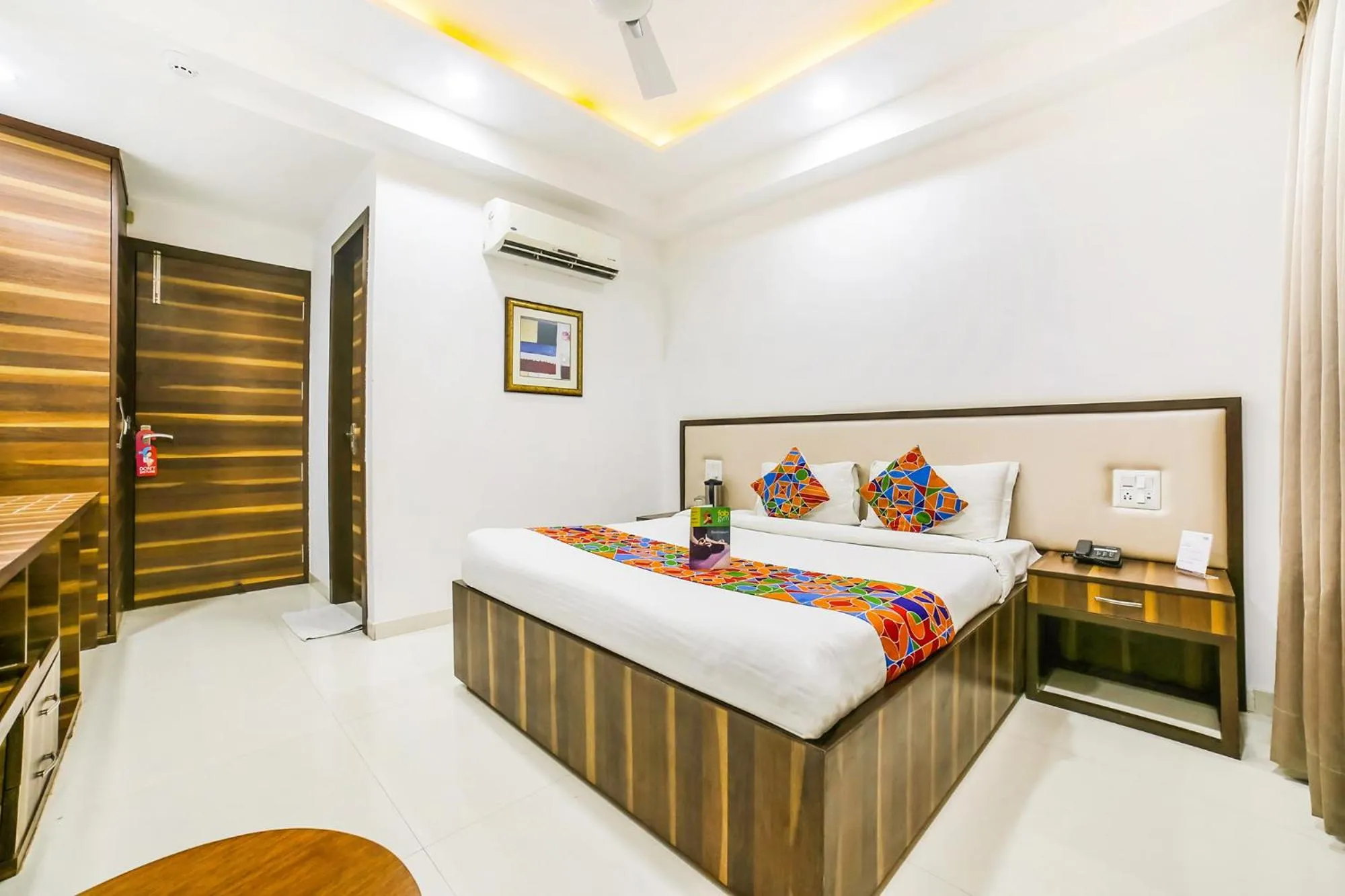 Bed in FabHotel Prime Sapphire Inn