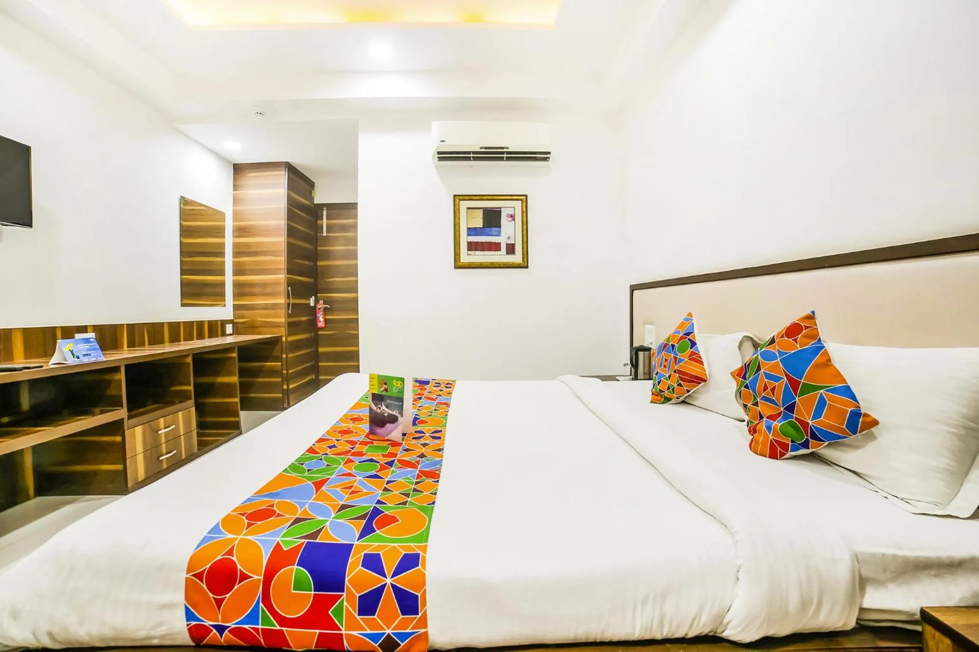 Bed in FabHotel Prime Sapphire Inn