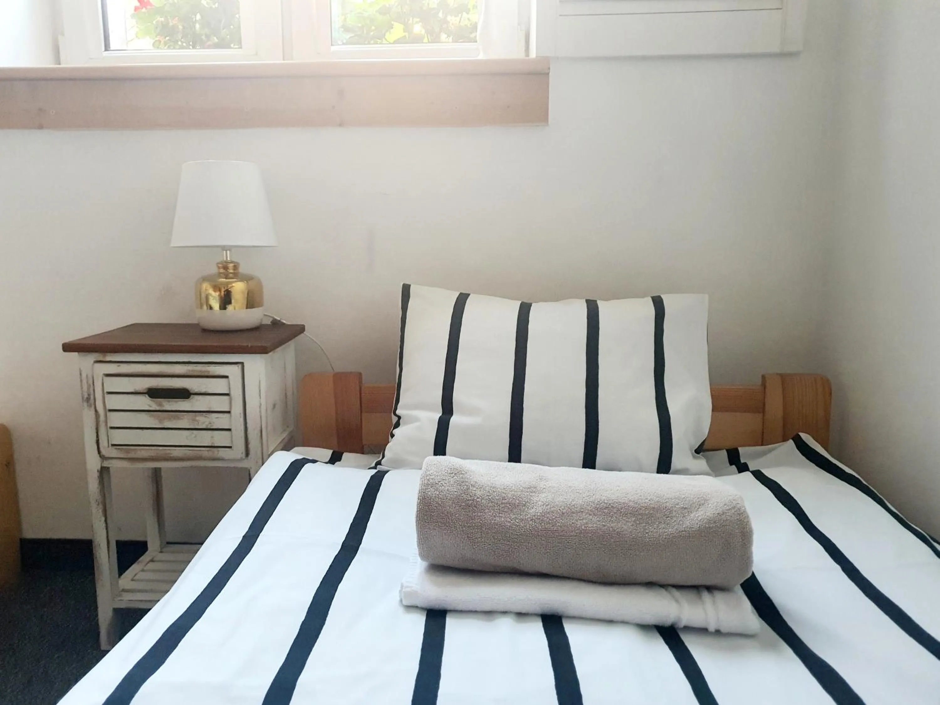 Bed in Master Corner Apartment