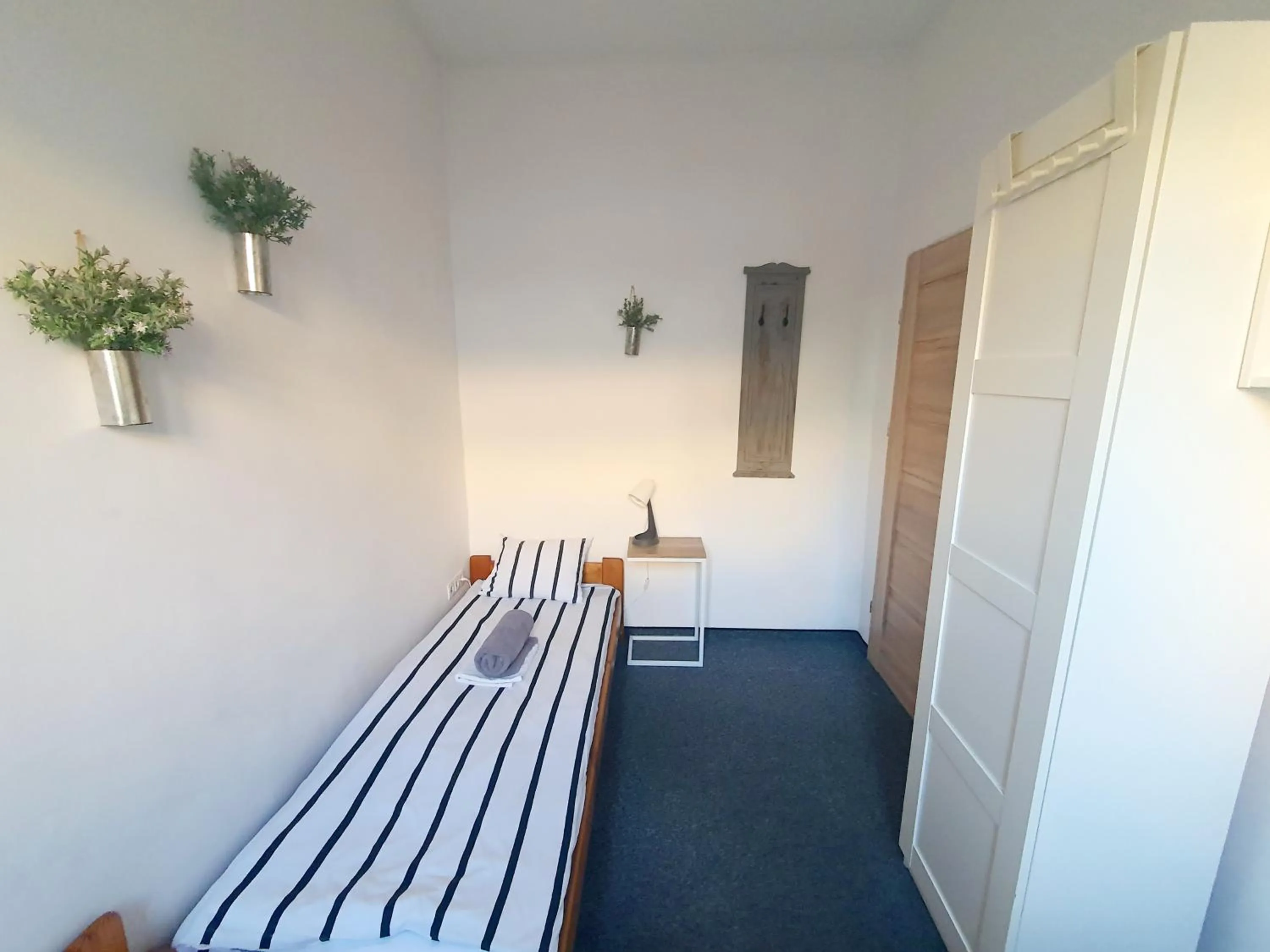 Photo of the whole room, Bed in Master Corner Apartment
