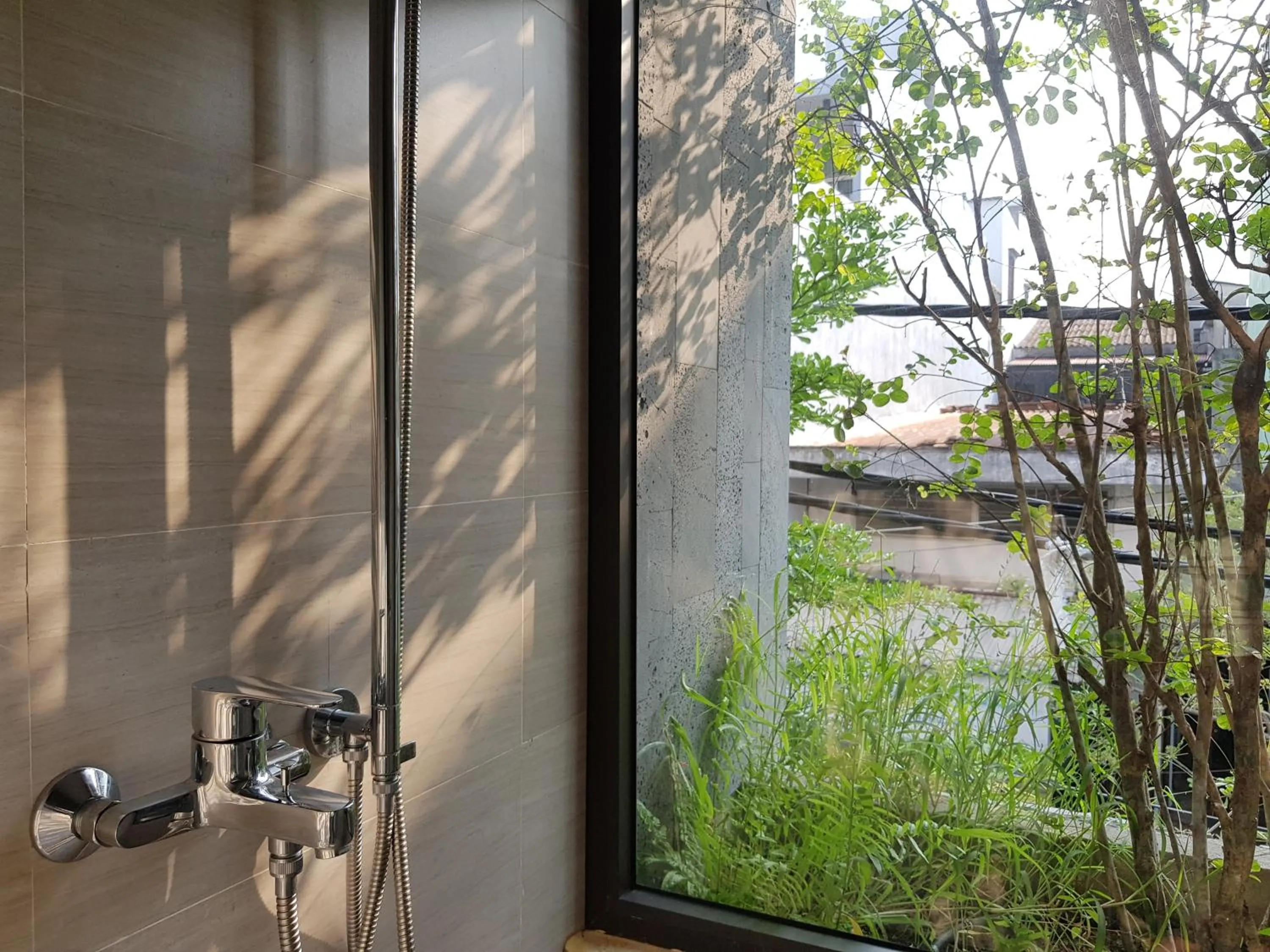 Shower in Mai's Boutique