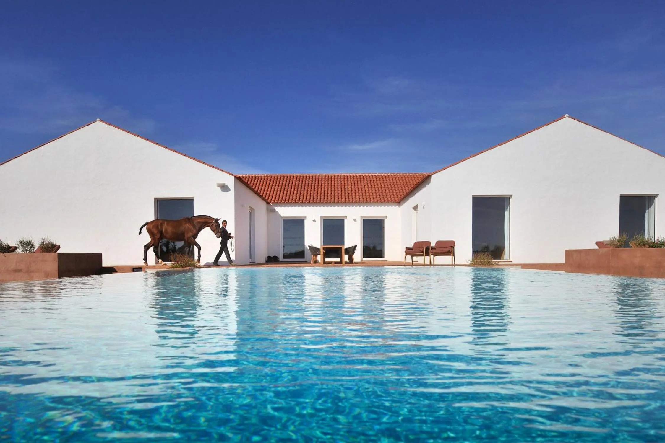 Swimming pool in Herdade da Malhadinha Nova - Relais & Châteaux