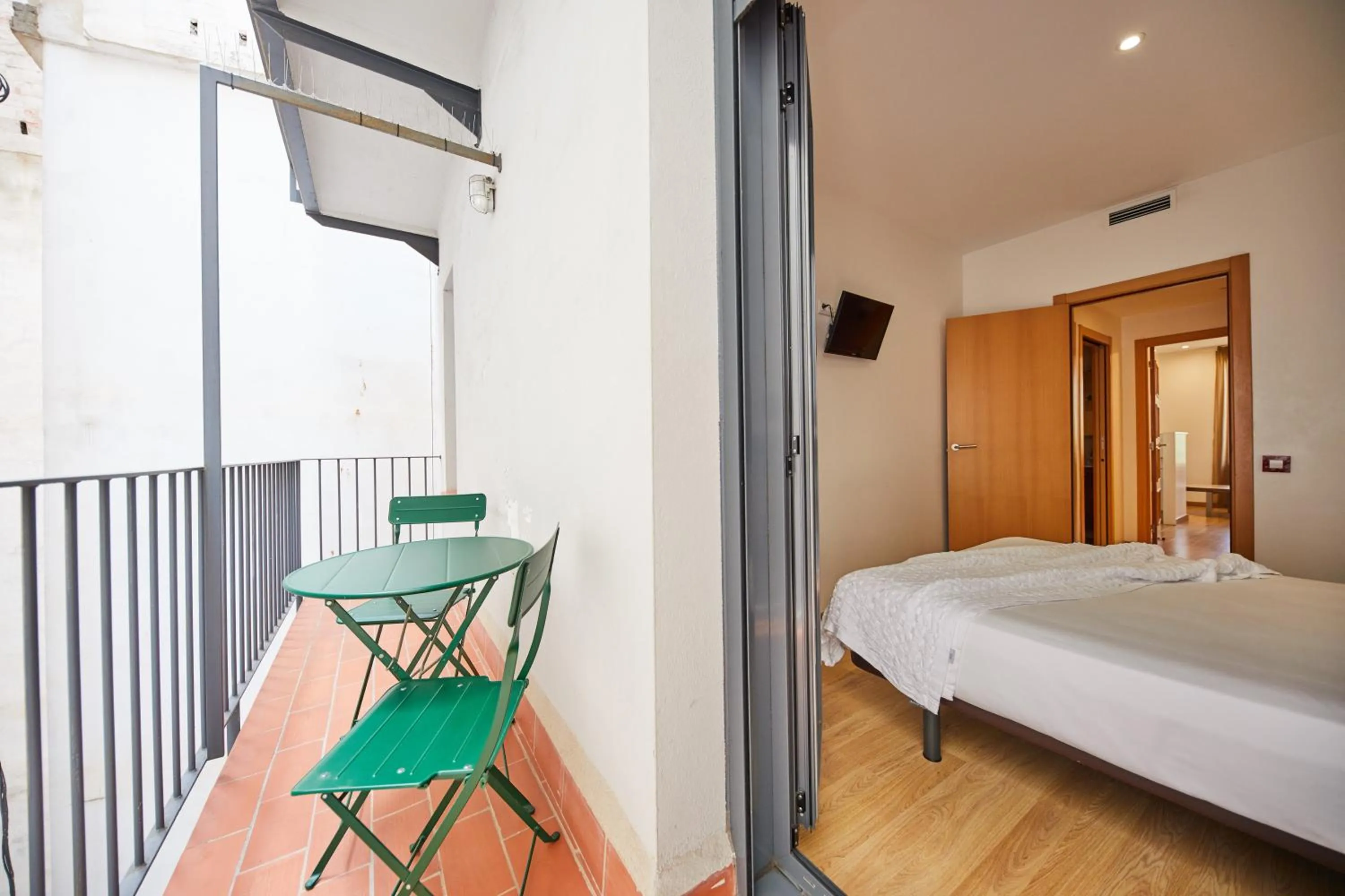 Bed in Apart-Suites Hostemplo