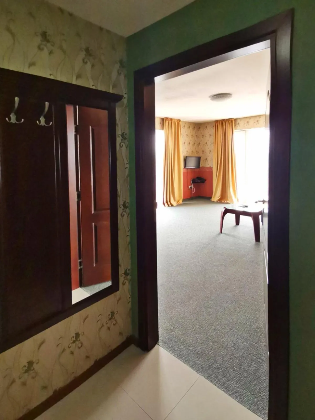 Communal lounge/ TV room in Twins Palace ApartHotel