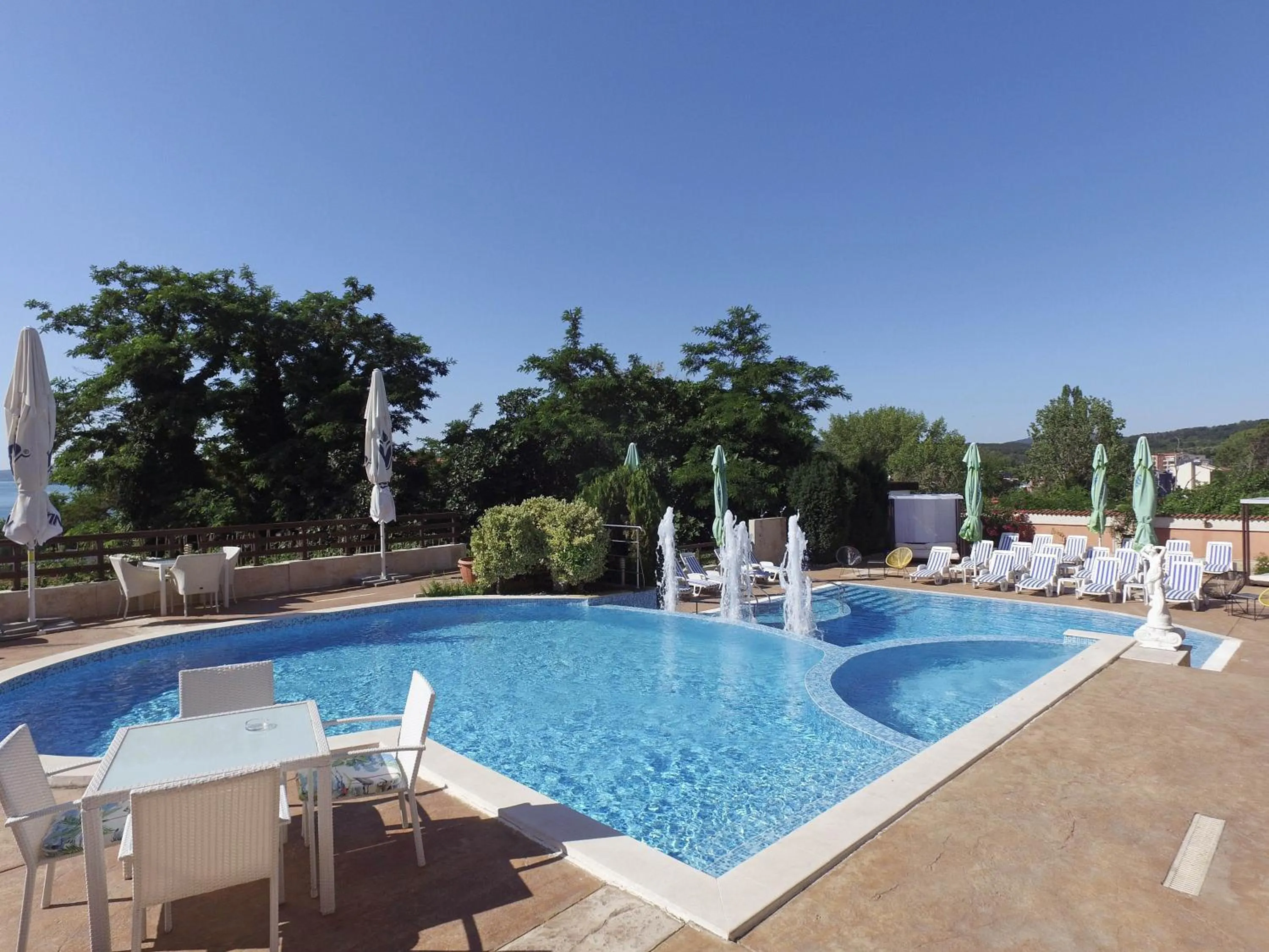 Pool view in Семеен хотел Golden Place