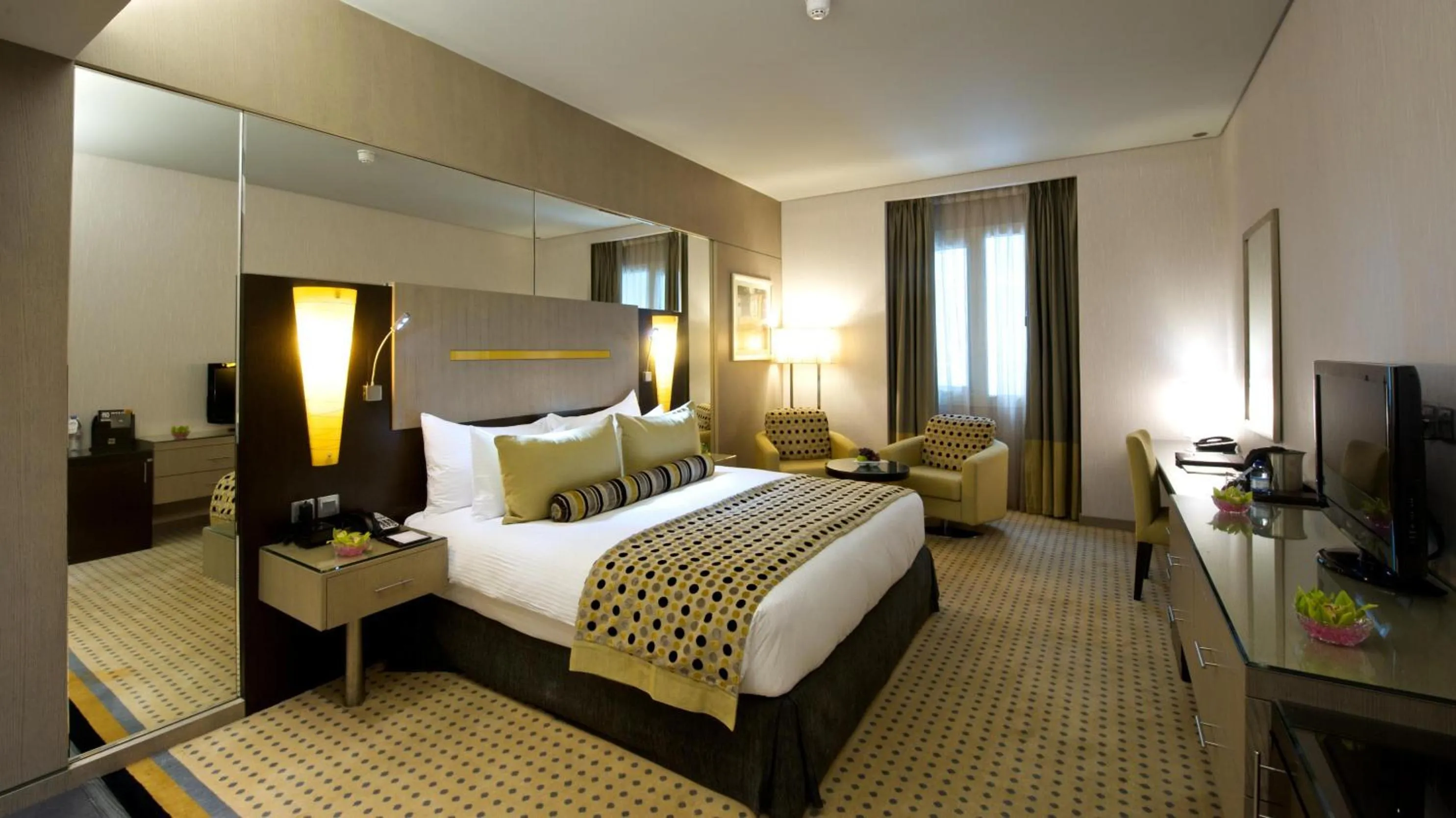 Photo of the whole room, Bed in TIME Grand Plaza Hotel, Dubai Airport