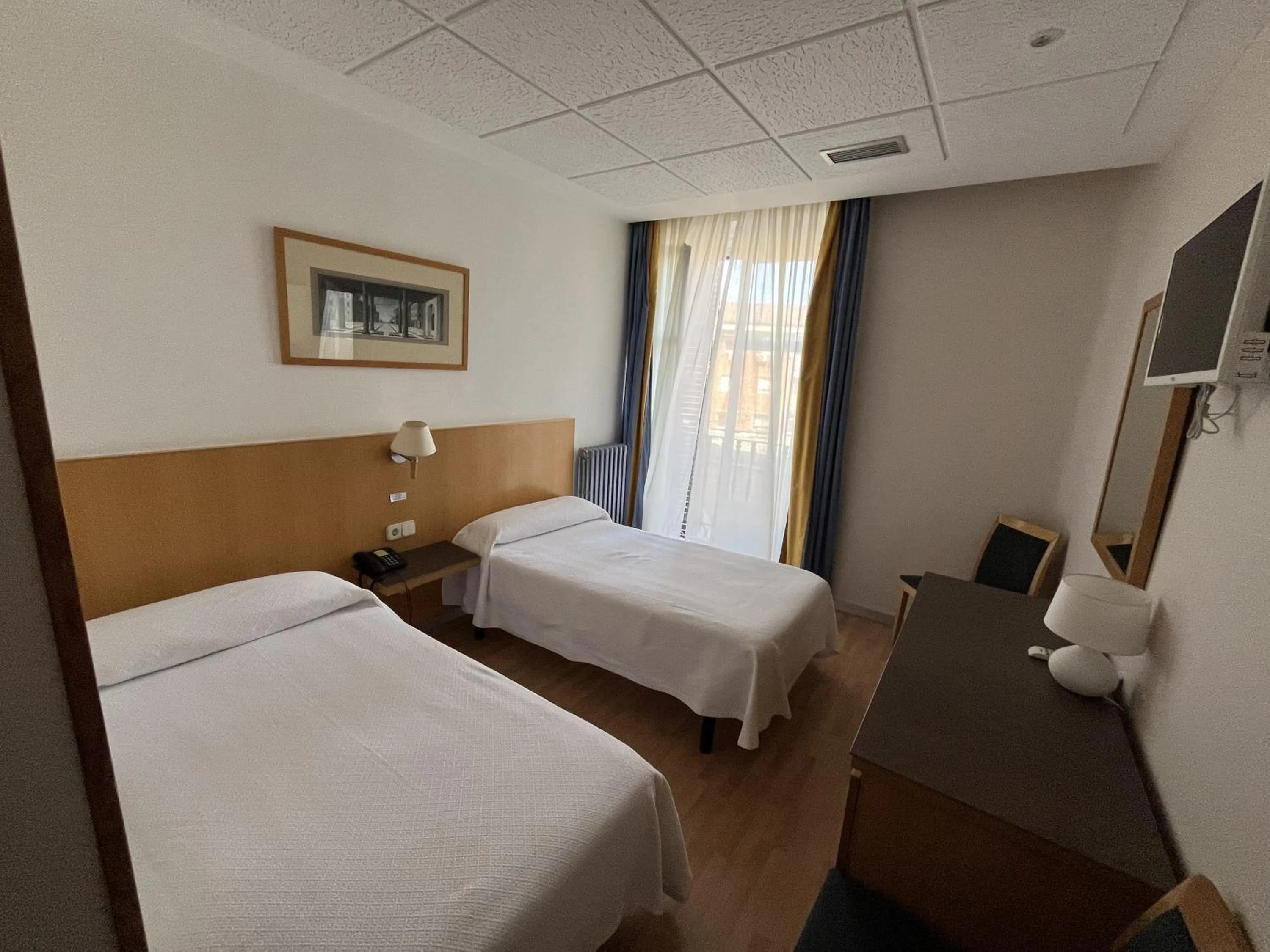 Bed in Hotel España