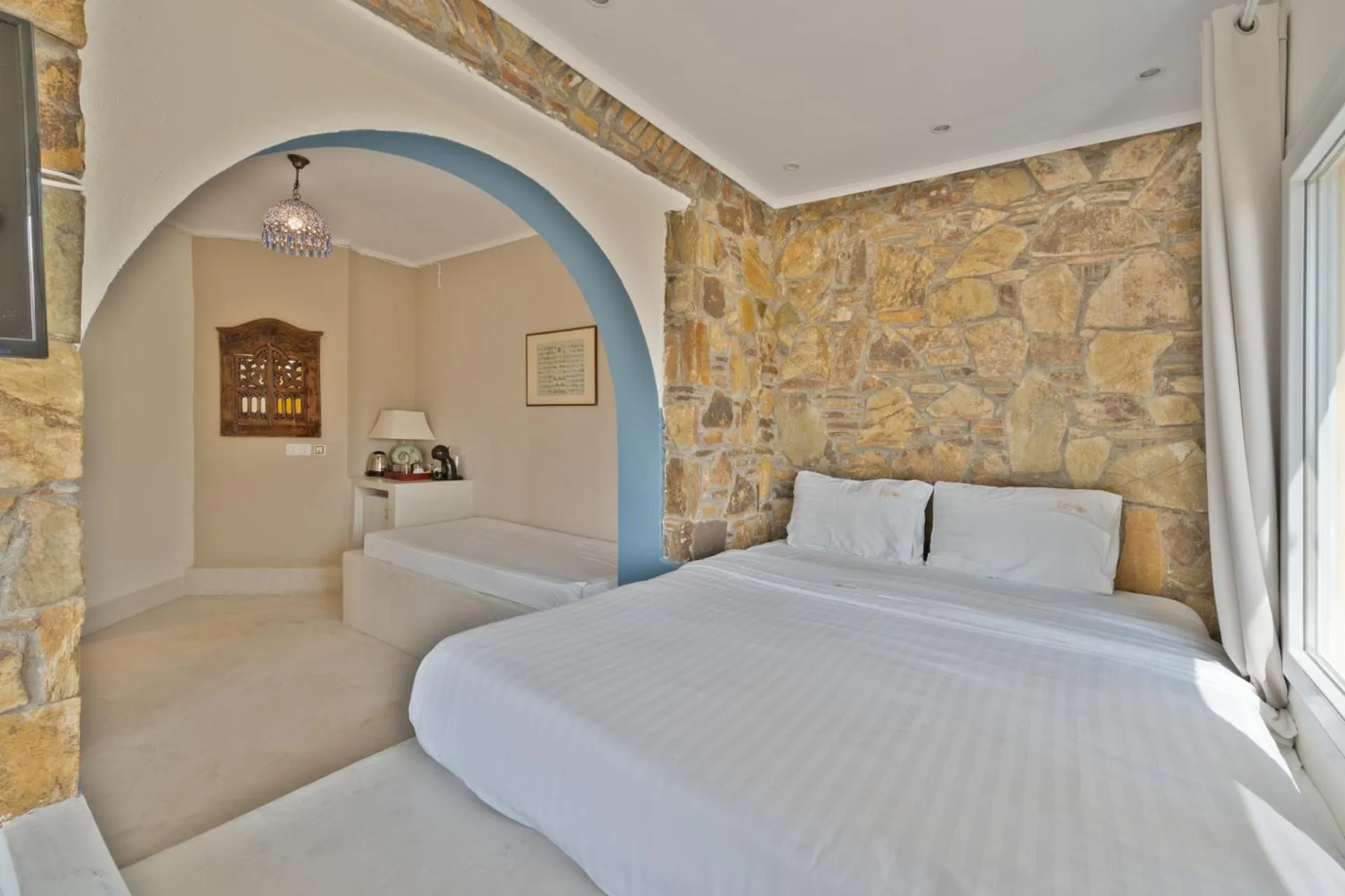 Bed in Kelyfos Hotel