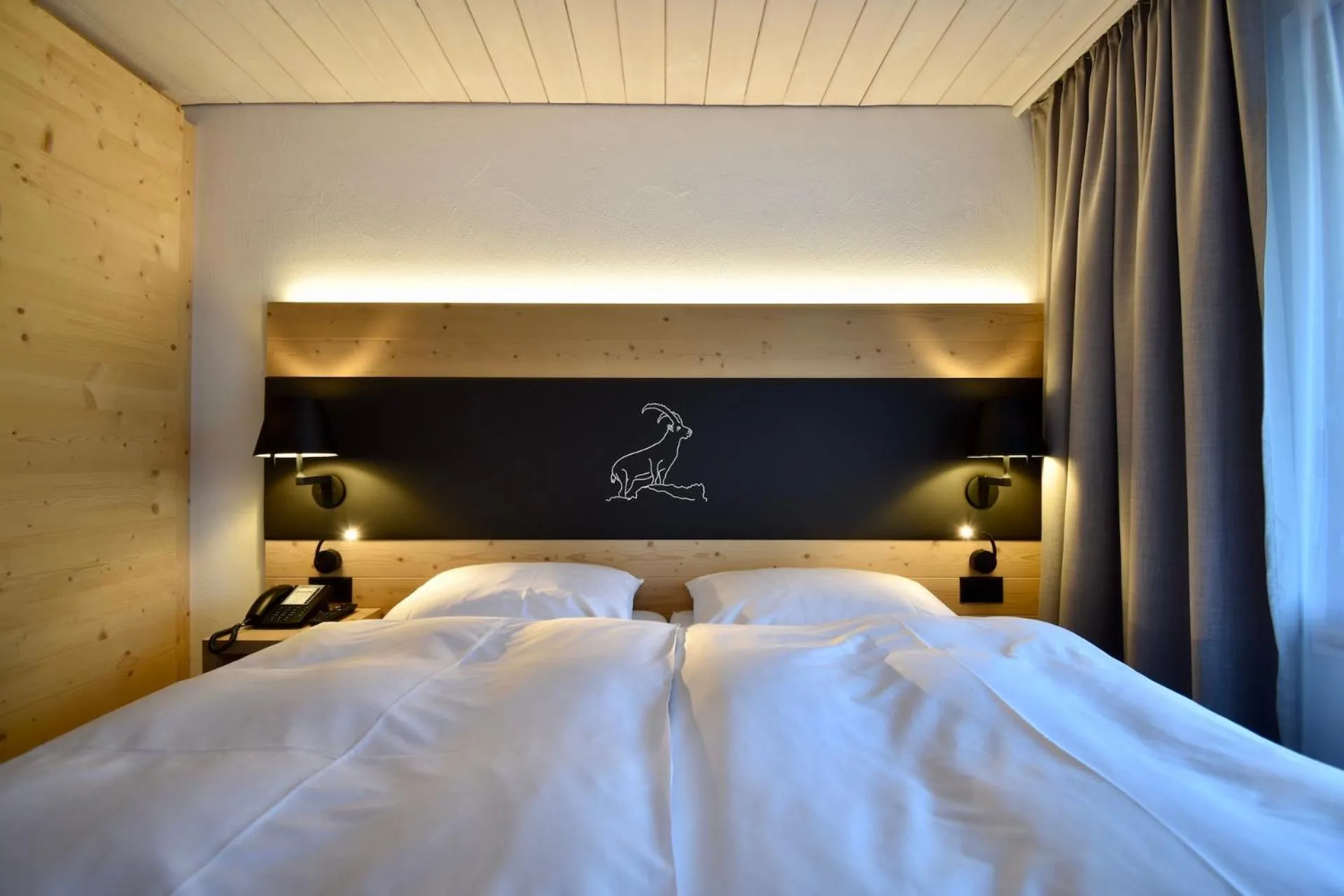 Bed in Hotel Laaxerhof