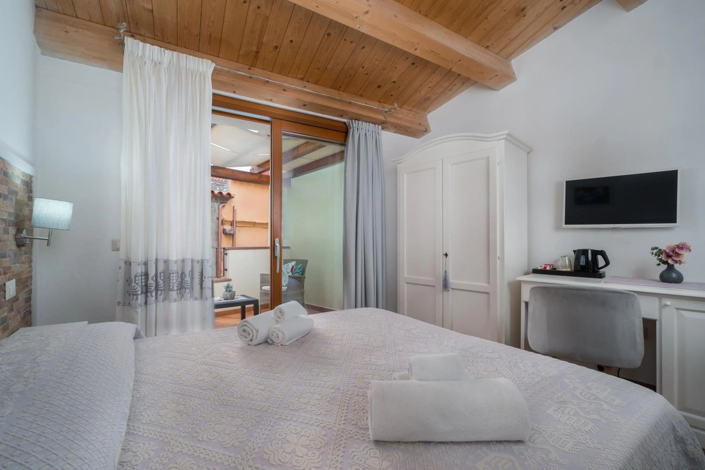 Bed in Bosa Queen House