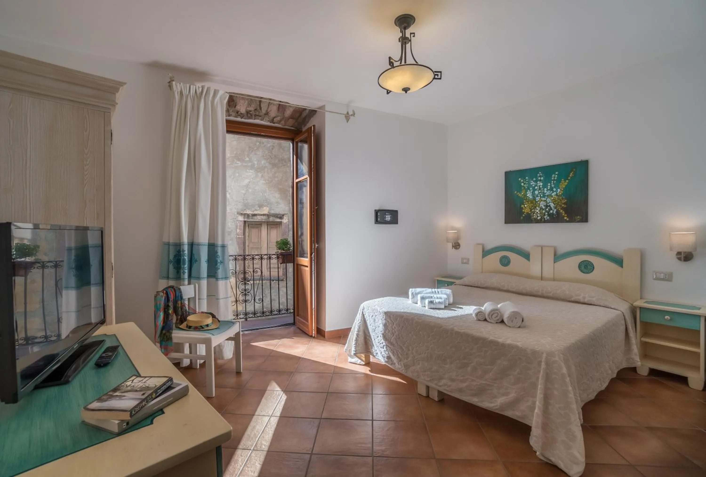 Bed in Bosa Queen House