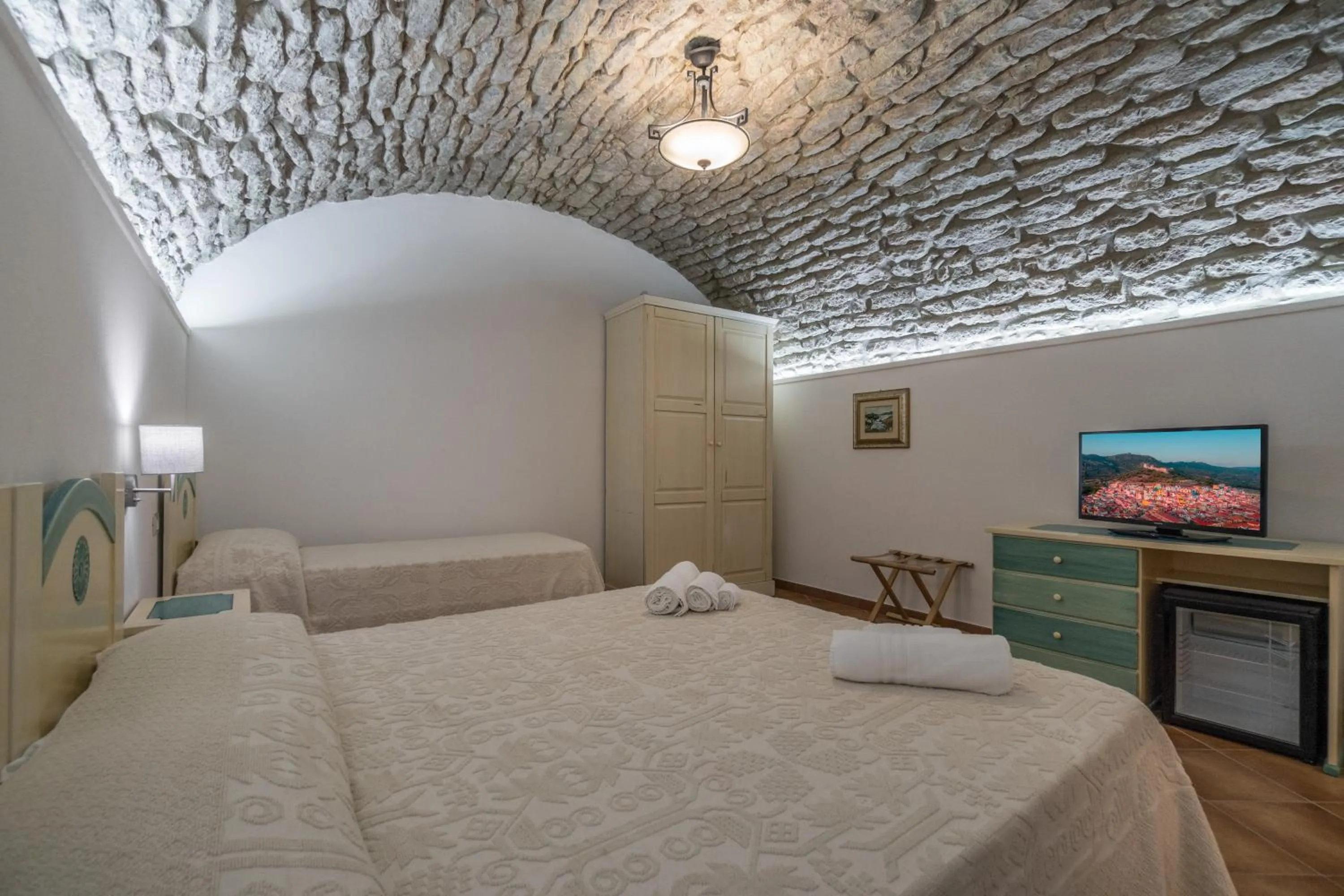 Bed in Bosa Queen House