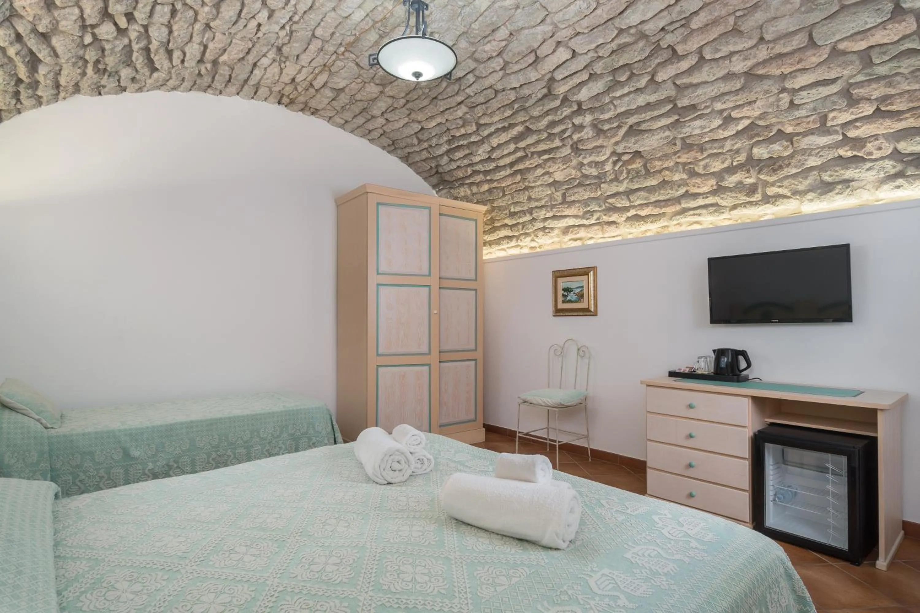 Bed in Bosa Queen House