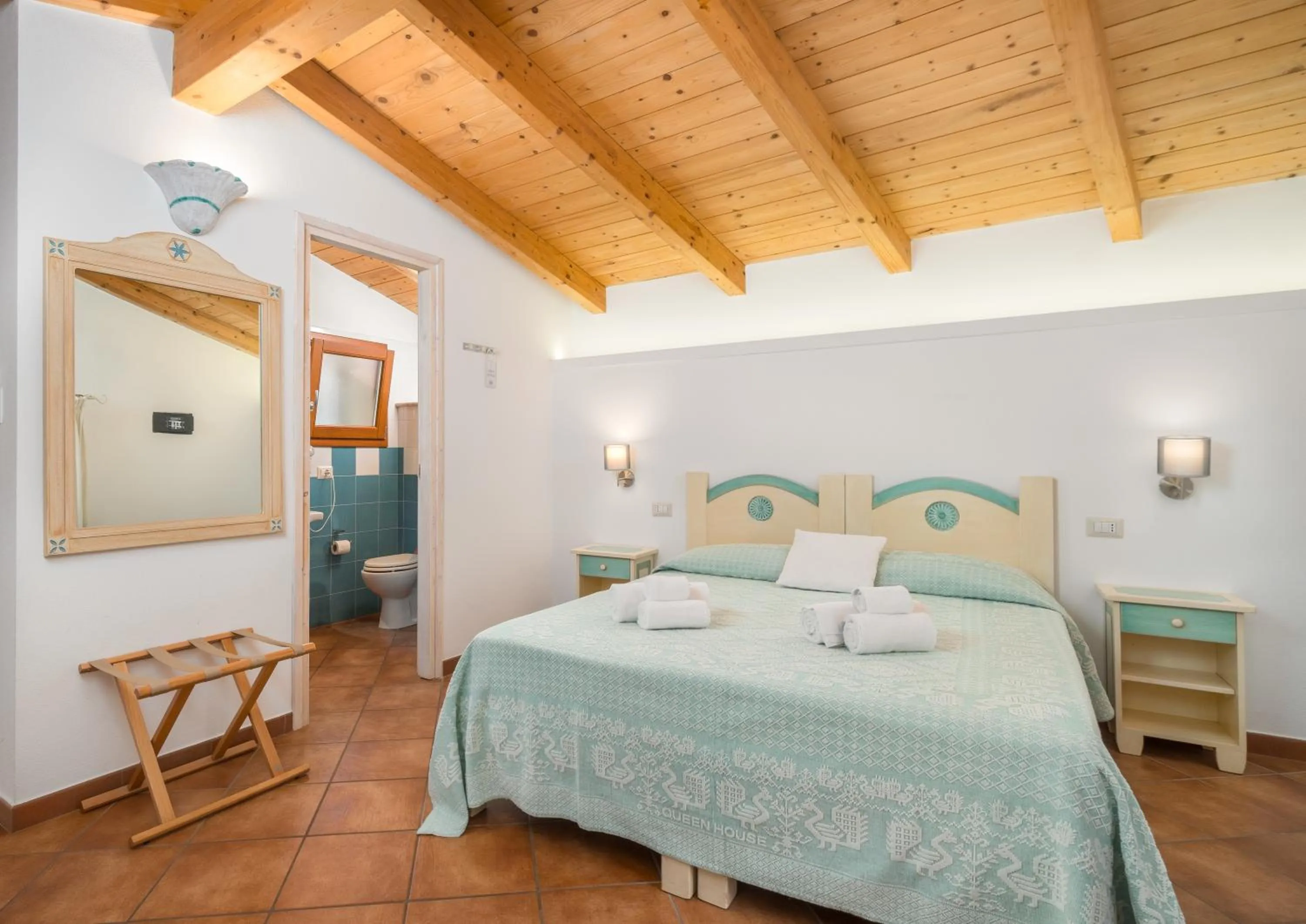 Bed in Bosa Queen House