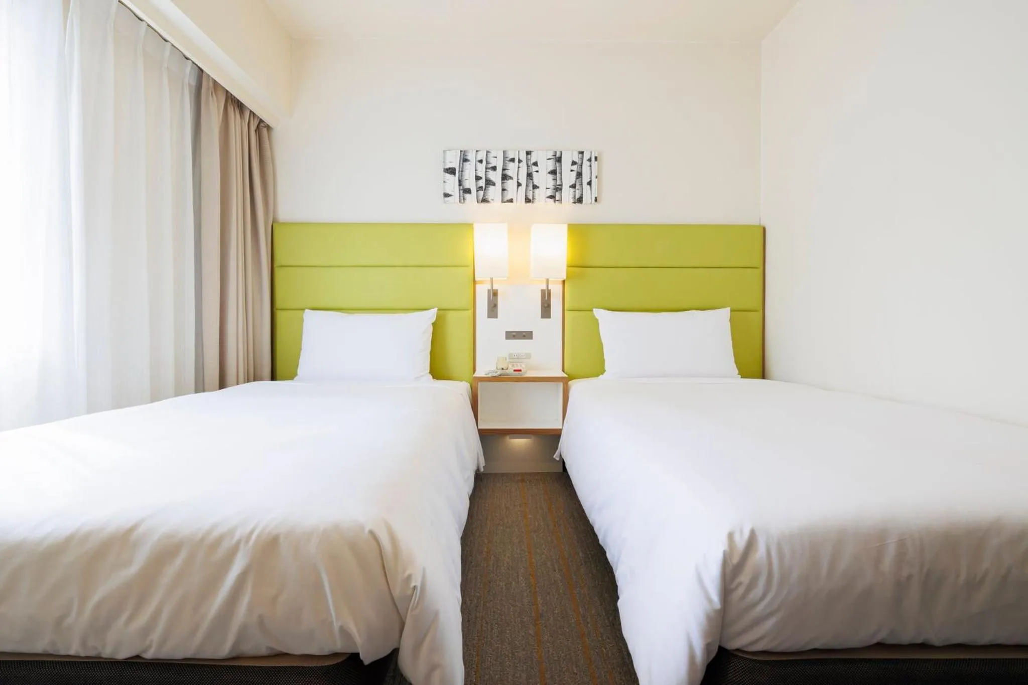 Photo of the whole room, Bed in ANA Holiday Inn Sapporo Susukino by IHG