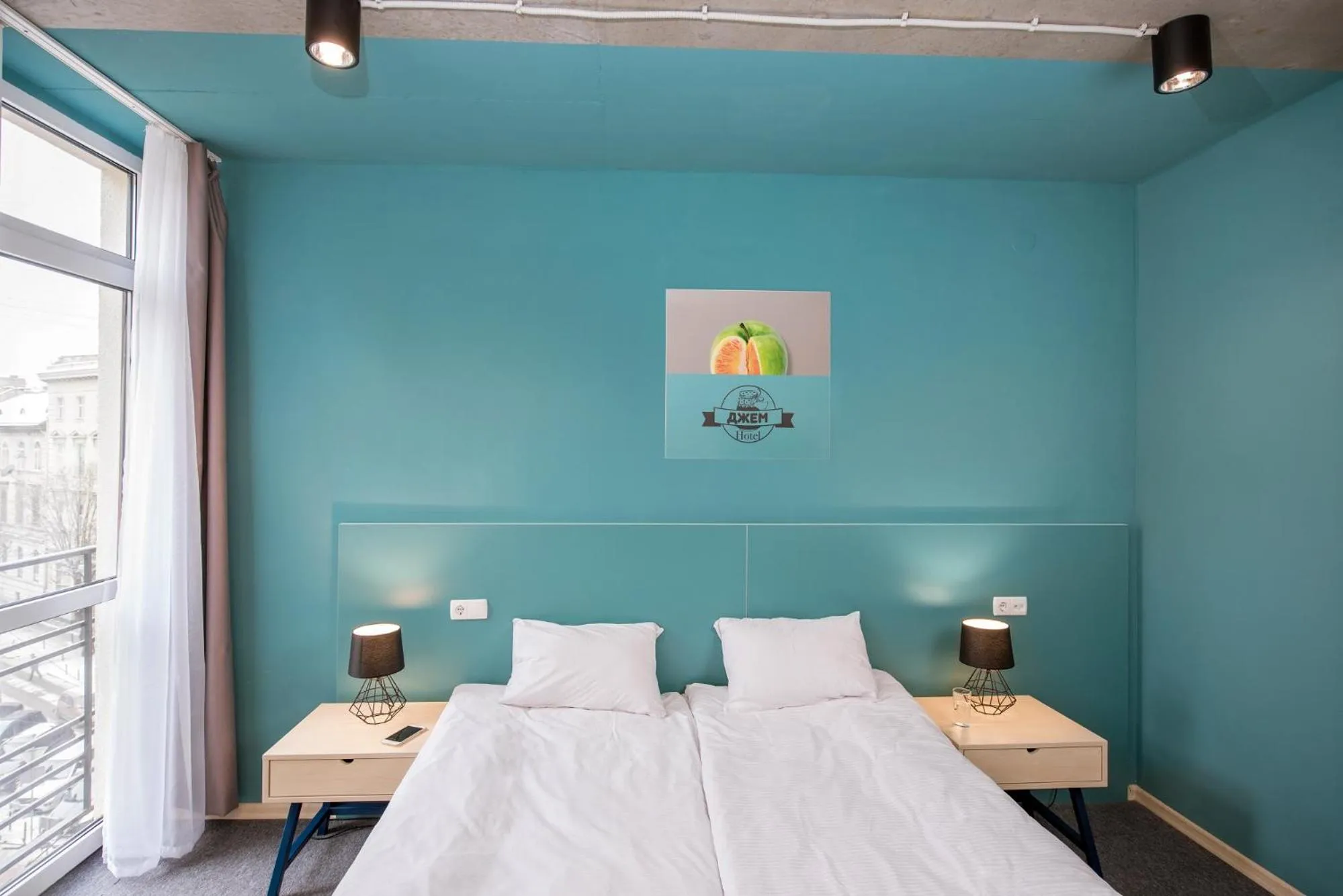 Photo of the whole room, Bed in Jam Hotel Hnatyuka