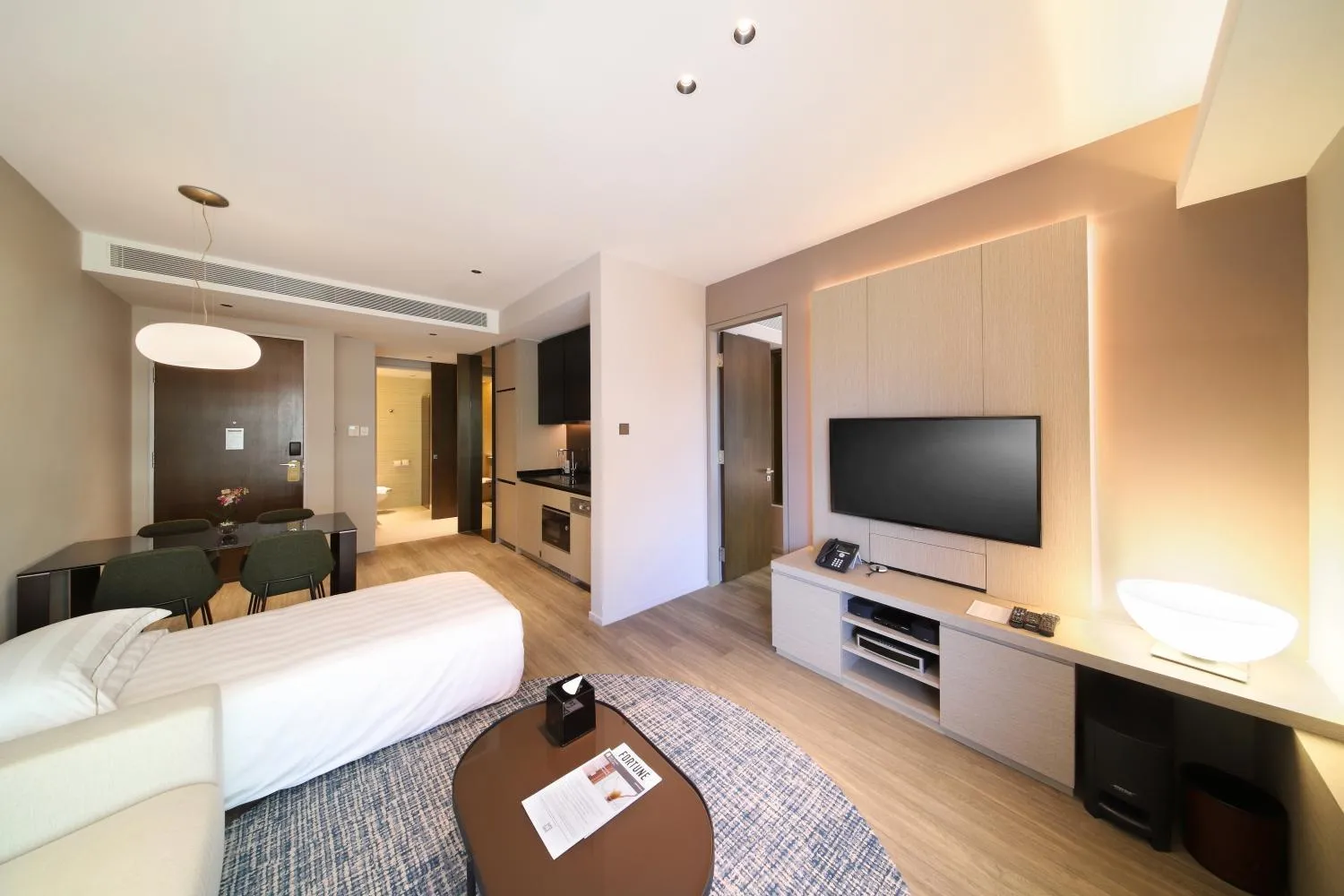 Living room, Bed in Pan Pacific Serviced Suites Orchard, Singapore