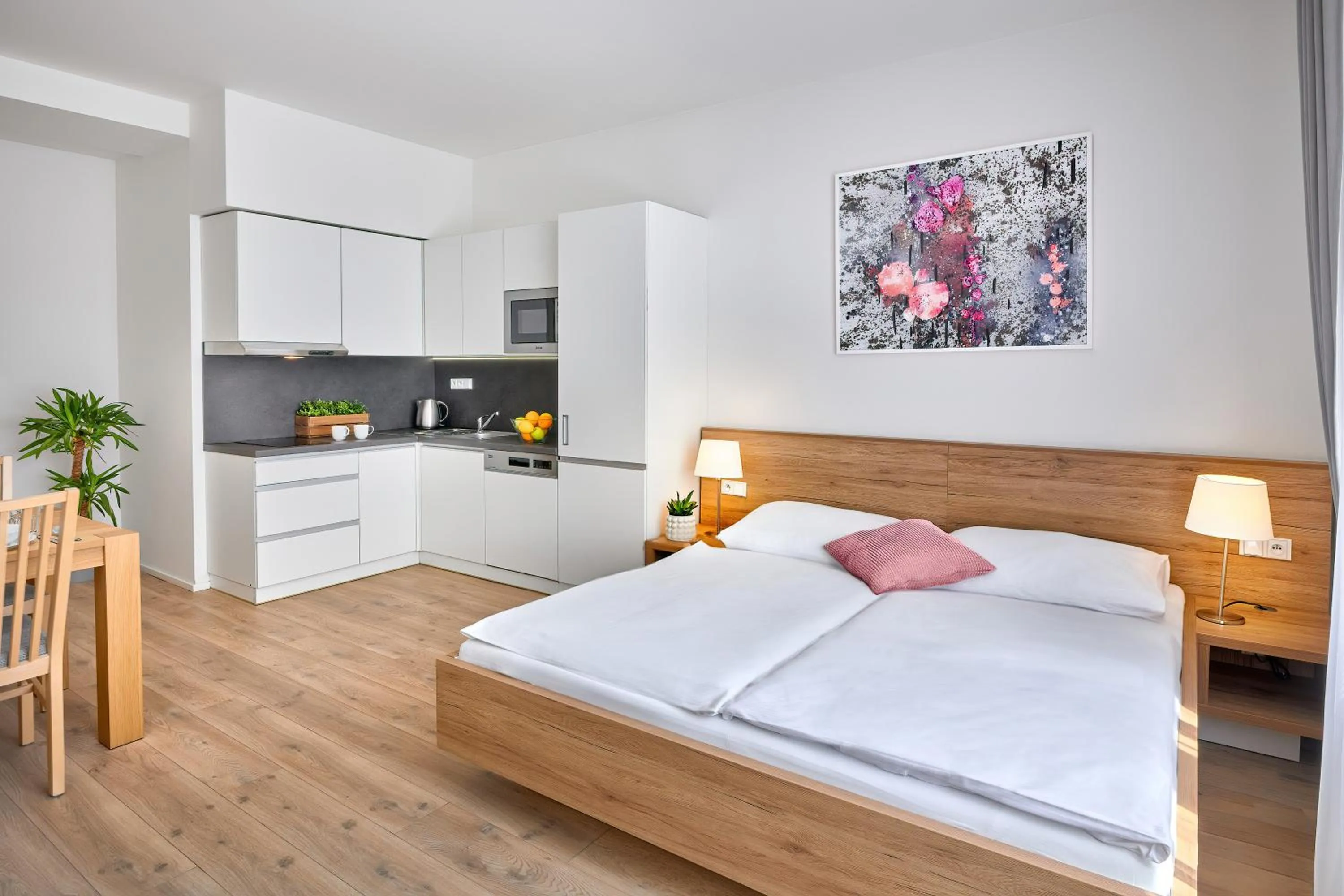 Kitchen or kitchenette, Bed in DownTown Suites Belohorska