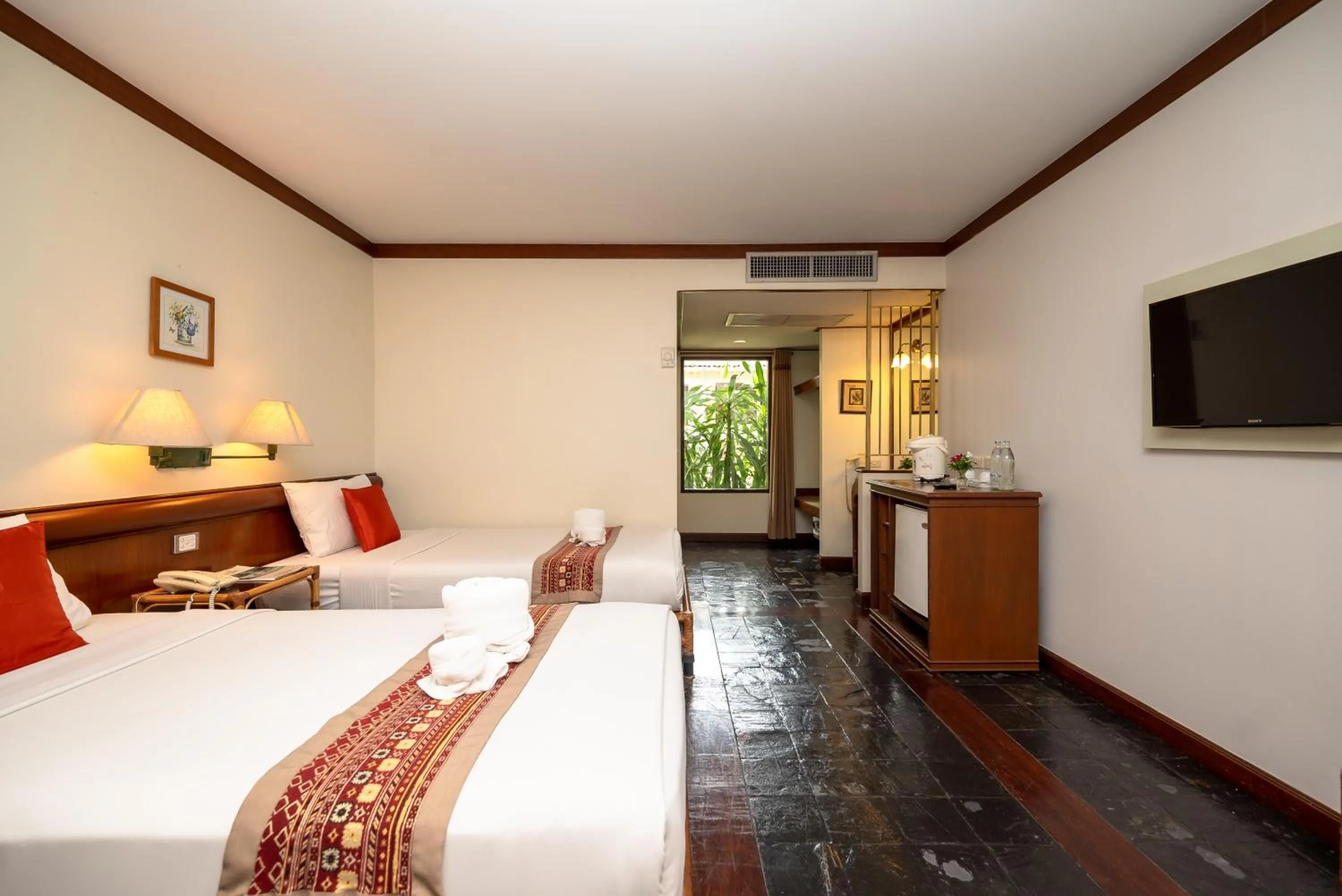 Photo of the whole room, Bed in Comsaed River Kwai Resort