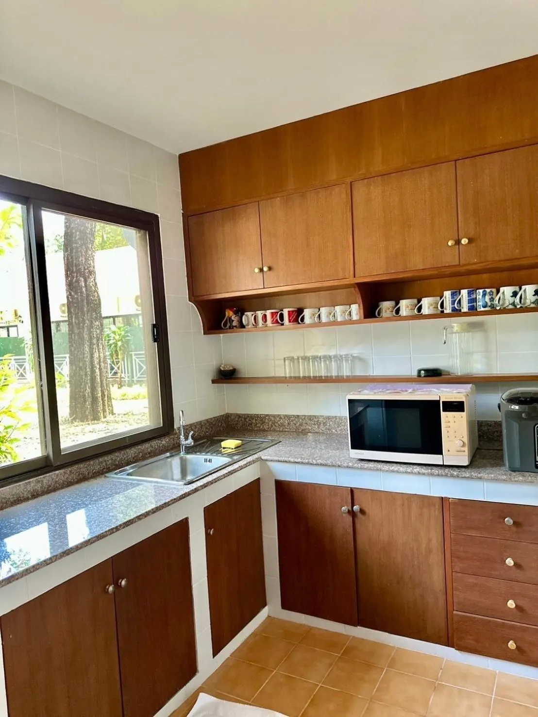 Kitchen or kitchenette in Comsaed River Kwai Resort