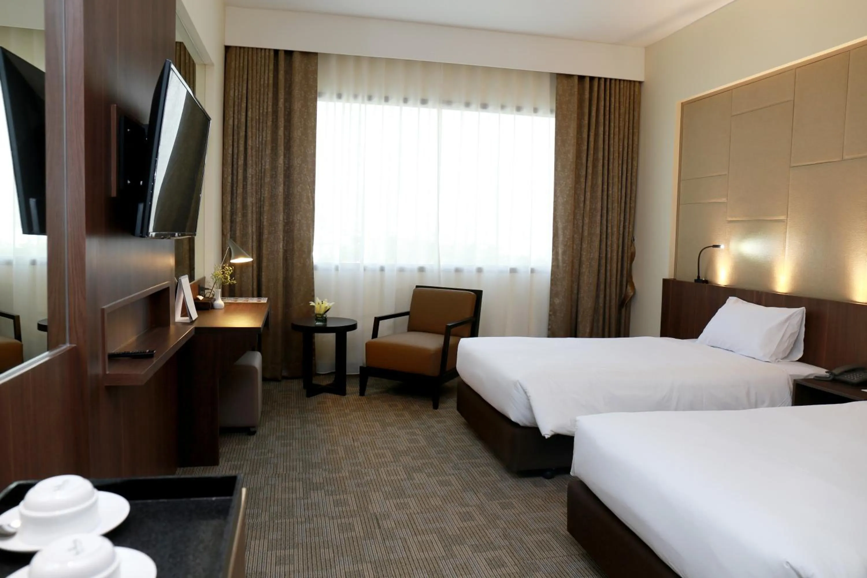 Bed in Louis Tavern Hotel