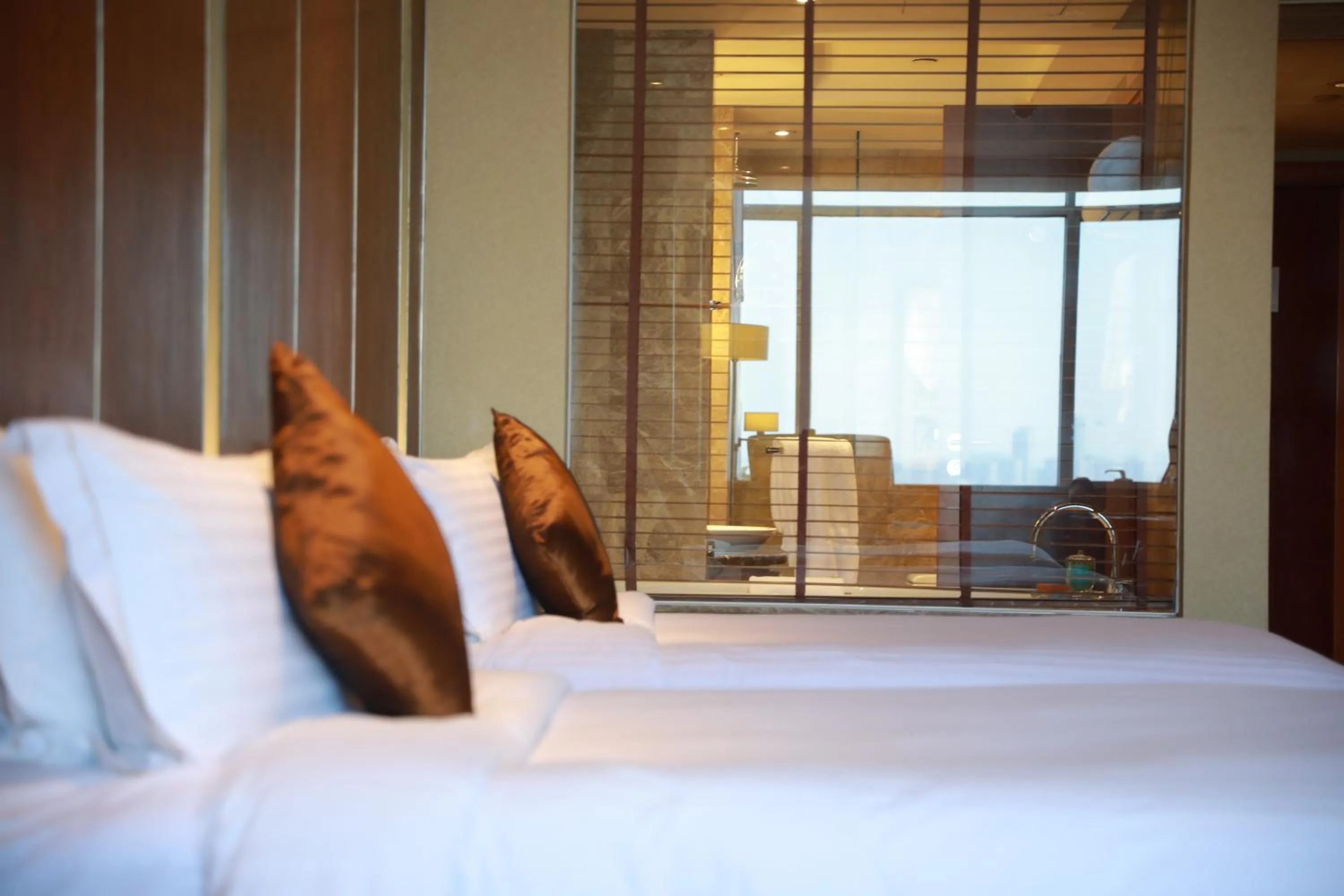 Bed in Dekin Hotel Chongqing Jiefangbei