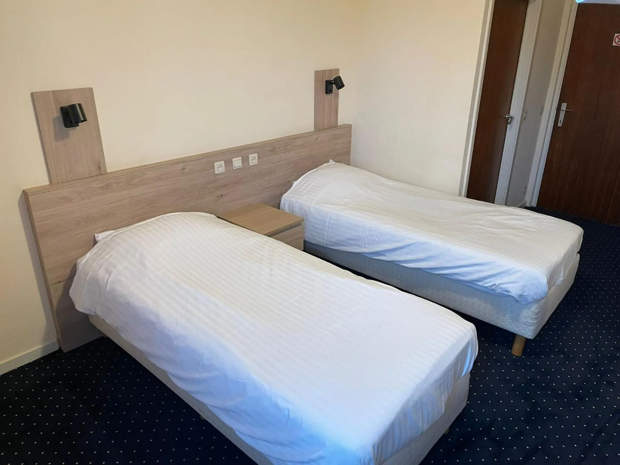 Bed in Hotel Bristol Internationaal