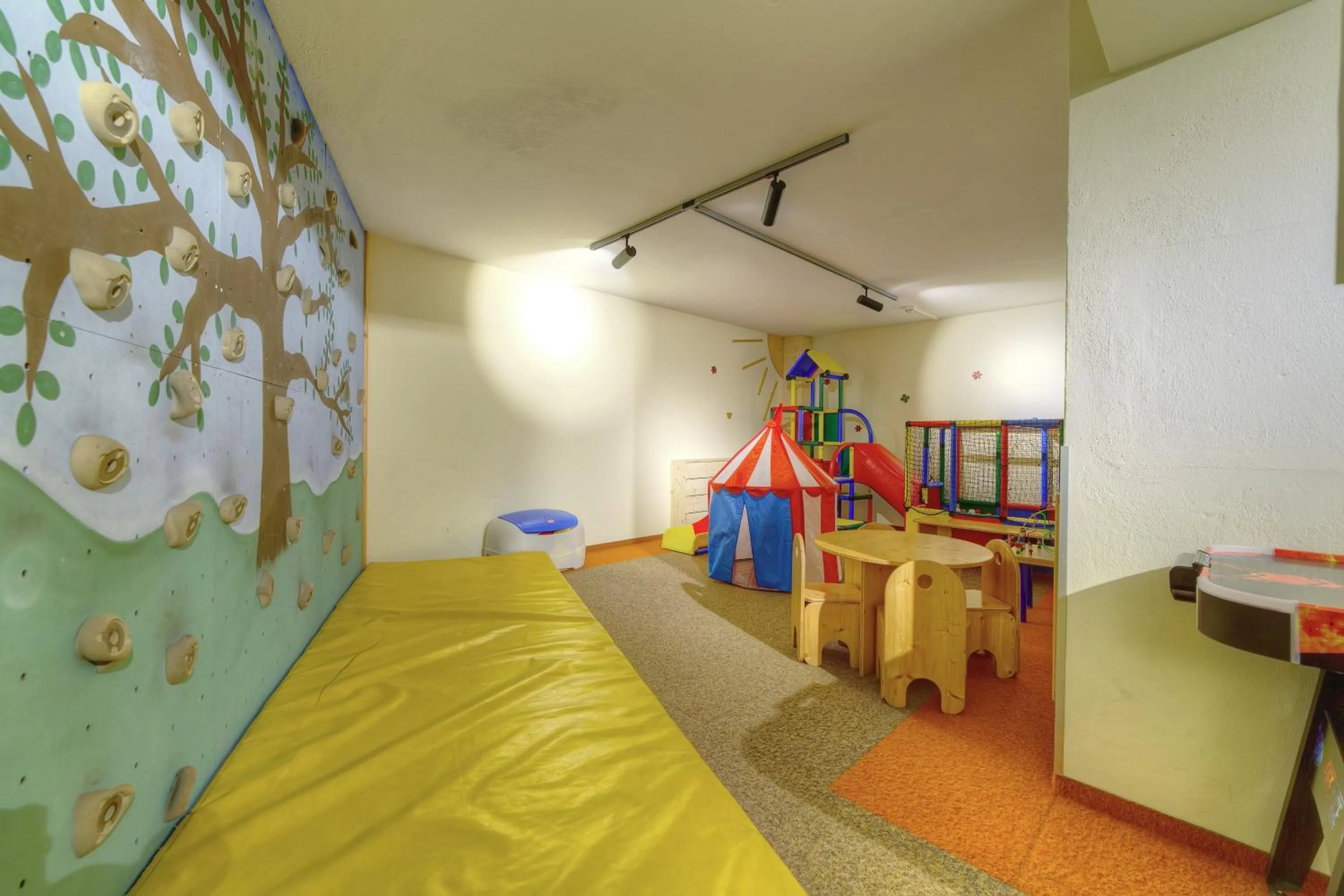 Children play ground in Aparthotel Dorfplatzl Garni Apartments & B&B