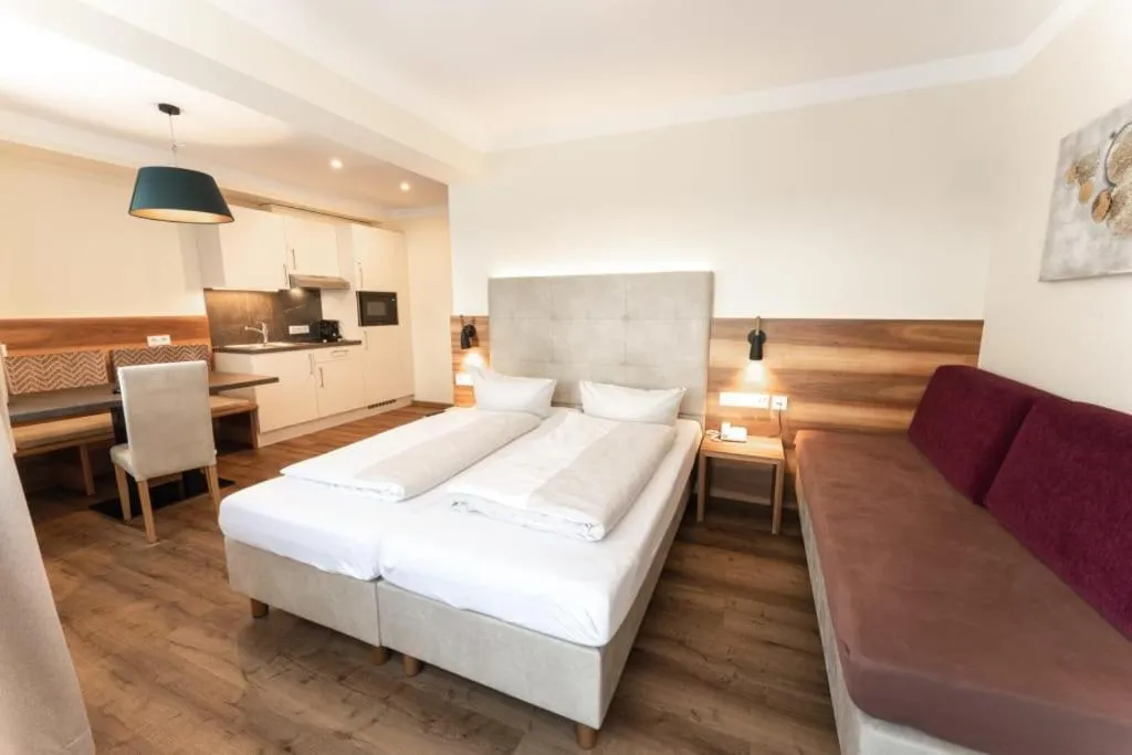Bedroom, Bed in Aparthotel Dorfplatzl Garni Apartments & B&B