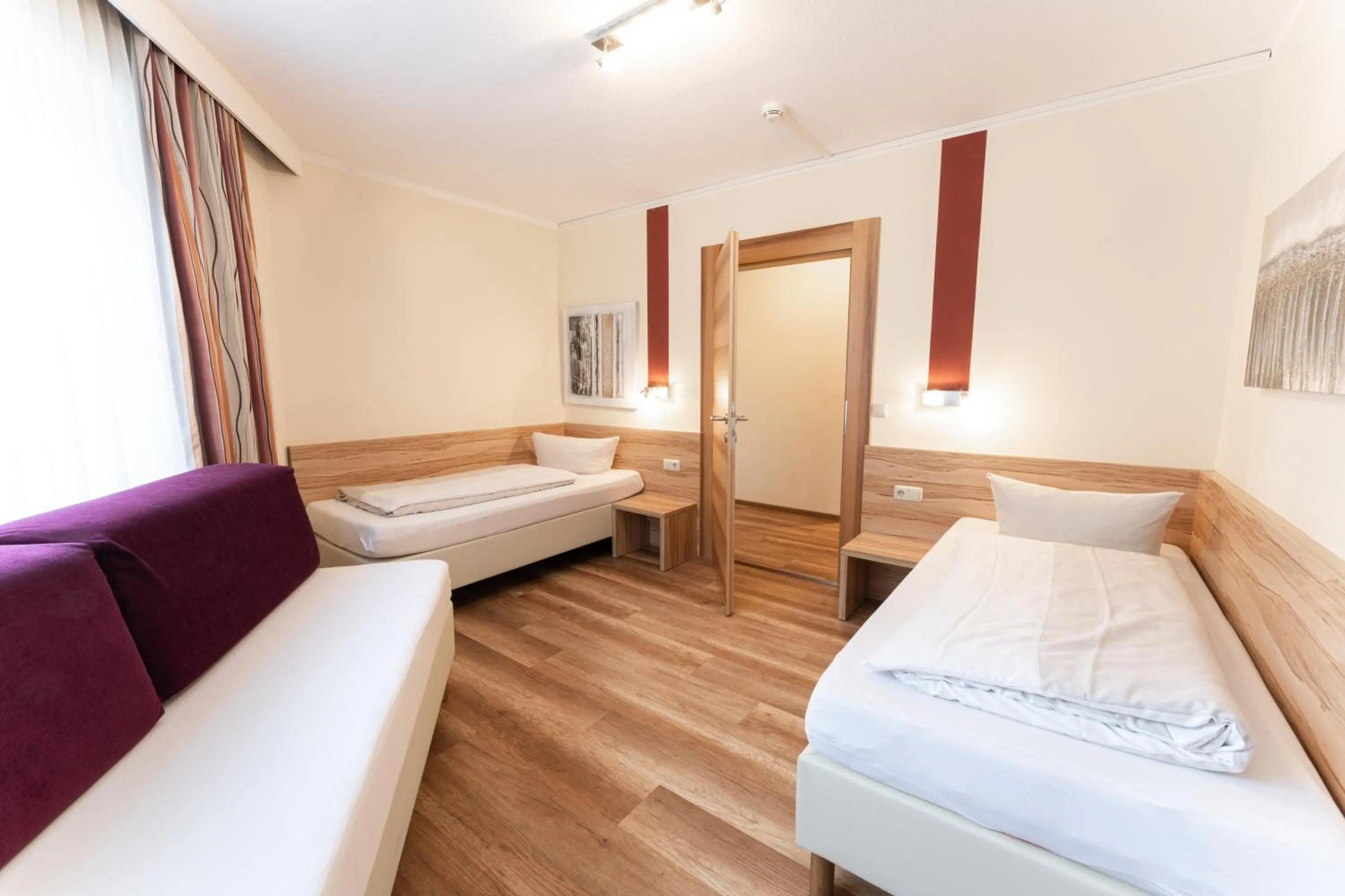 Bed in Aparthotel Dorfplatzl Garni Apartments & B&B