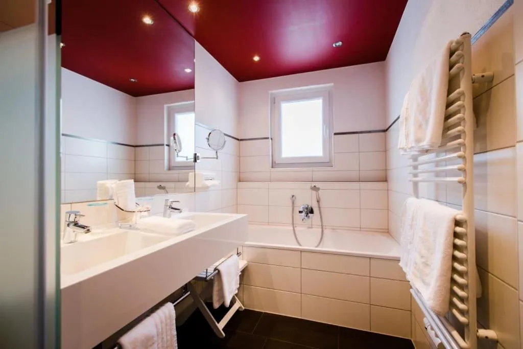 Shower in Aparthotel Dorfplatzl Garni Apartments & B&B