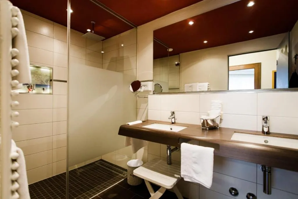 Shower in Aparthotel Dorfplatzl Garni Apartments & B&B