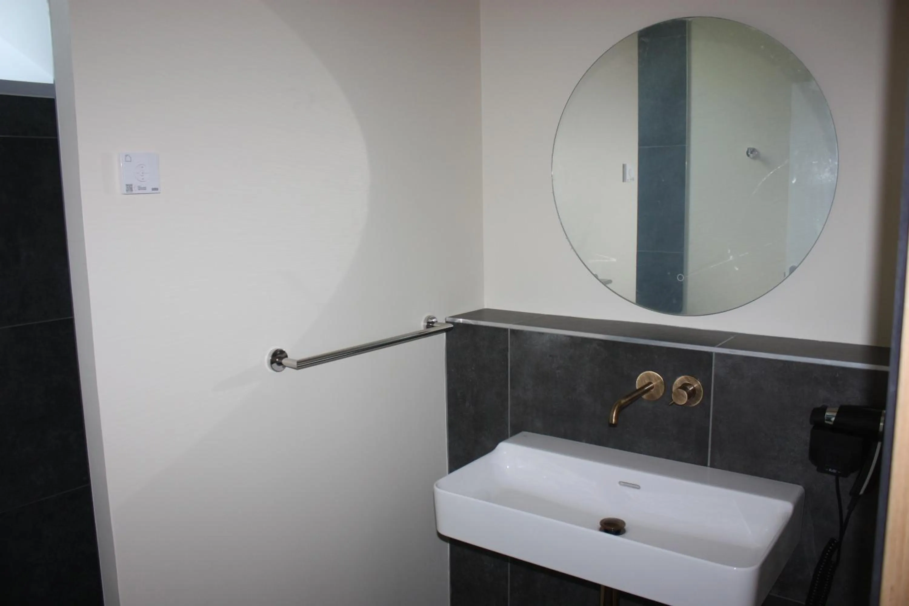 Bathroom in La Ferme Blanche, The Originals Relais