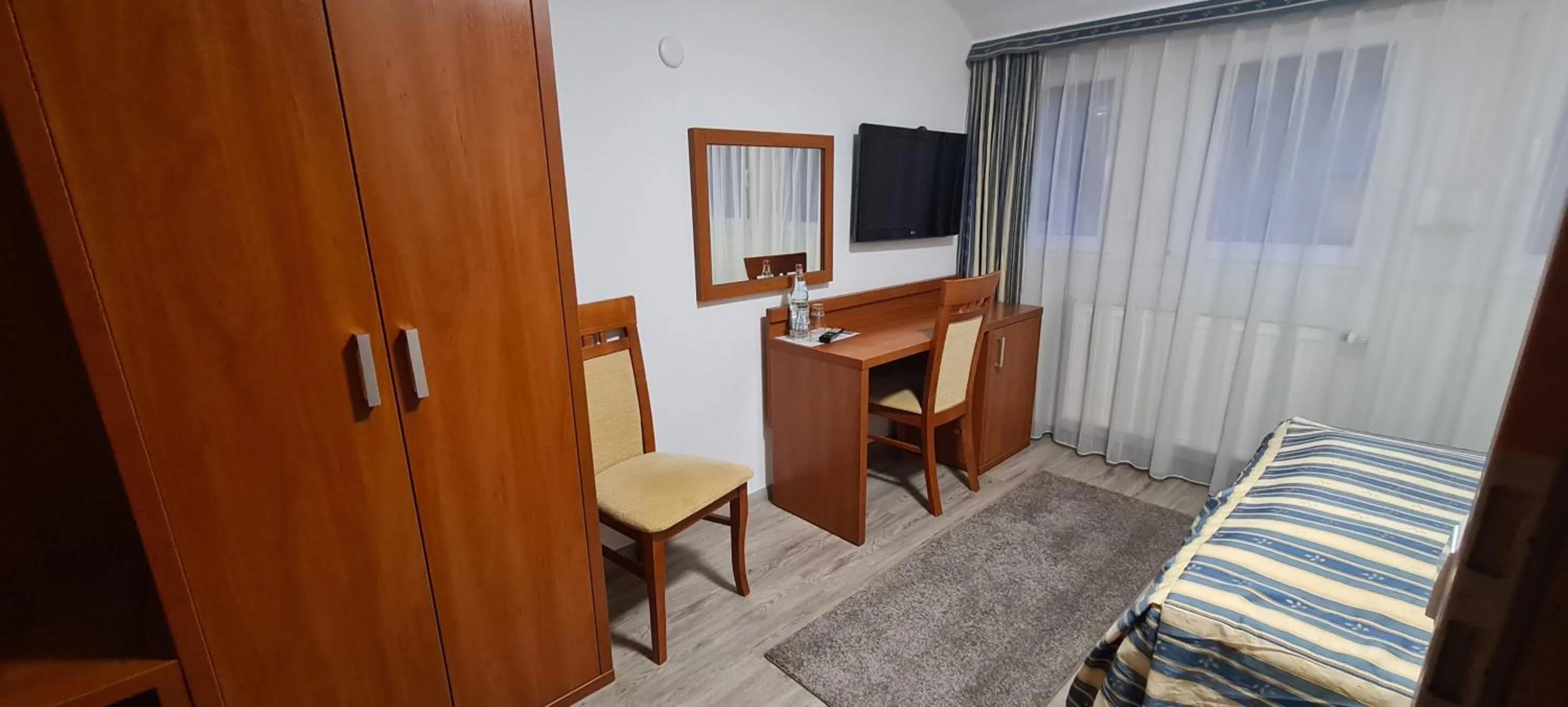 Photo of the whole room, Bed in M-A-S-Hotel