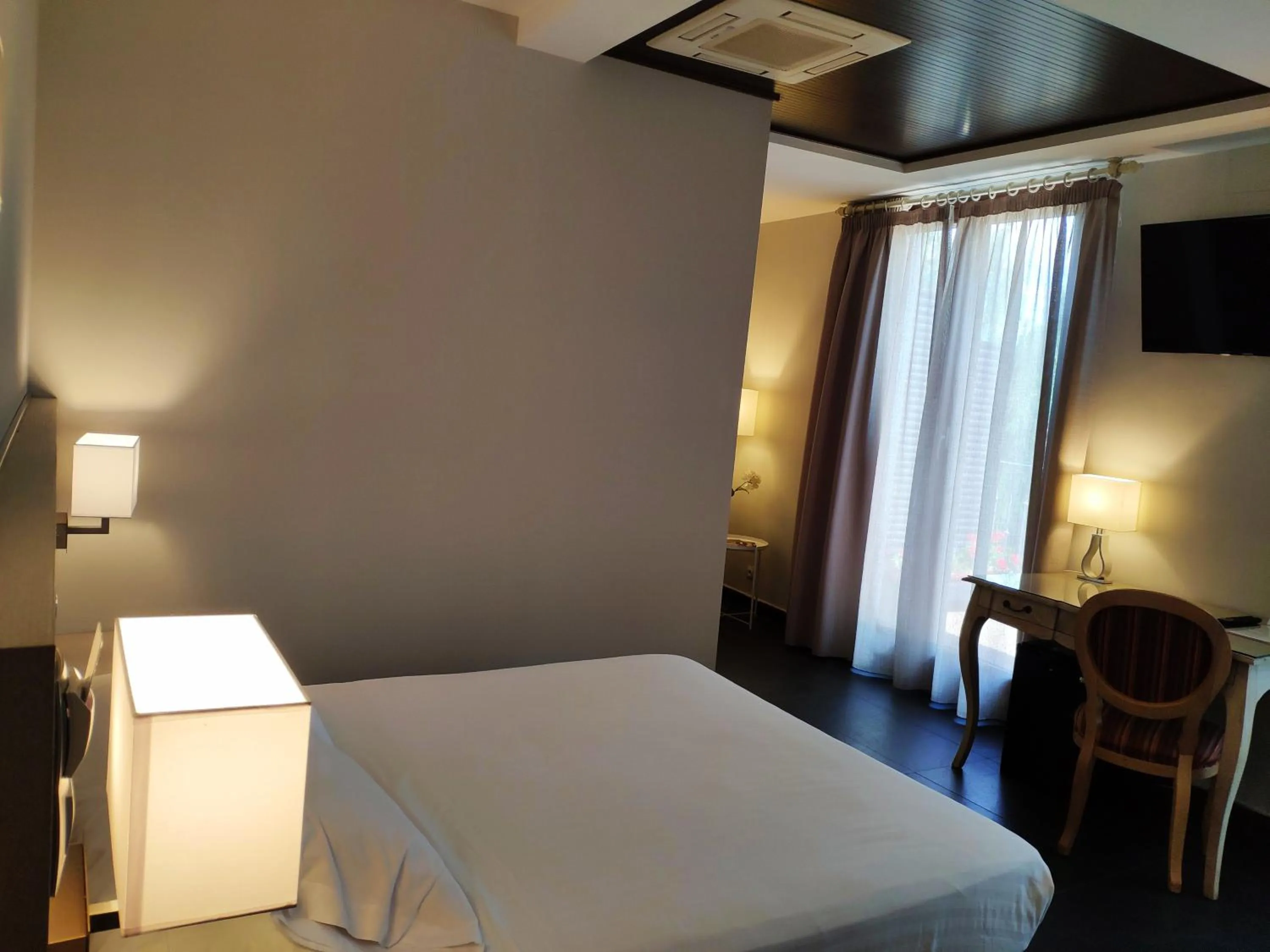 Bed in Hotel Puerta del Arco