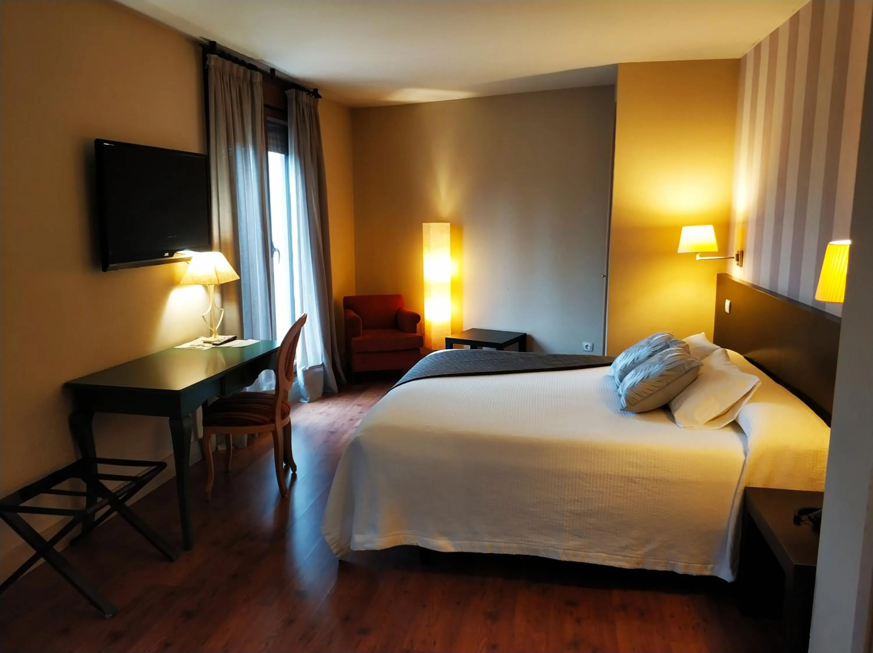 Bed in Hotel Puerta del Arco