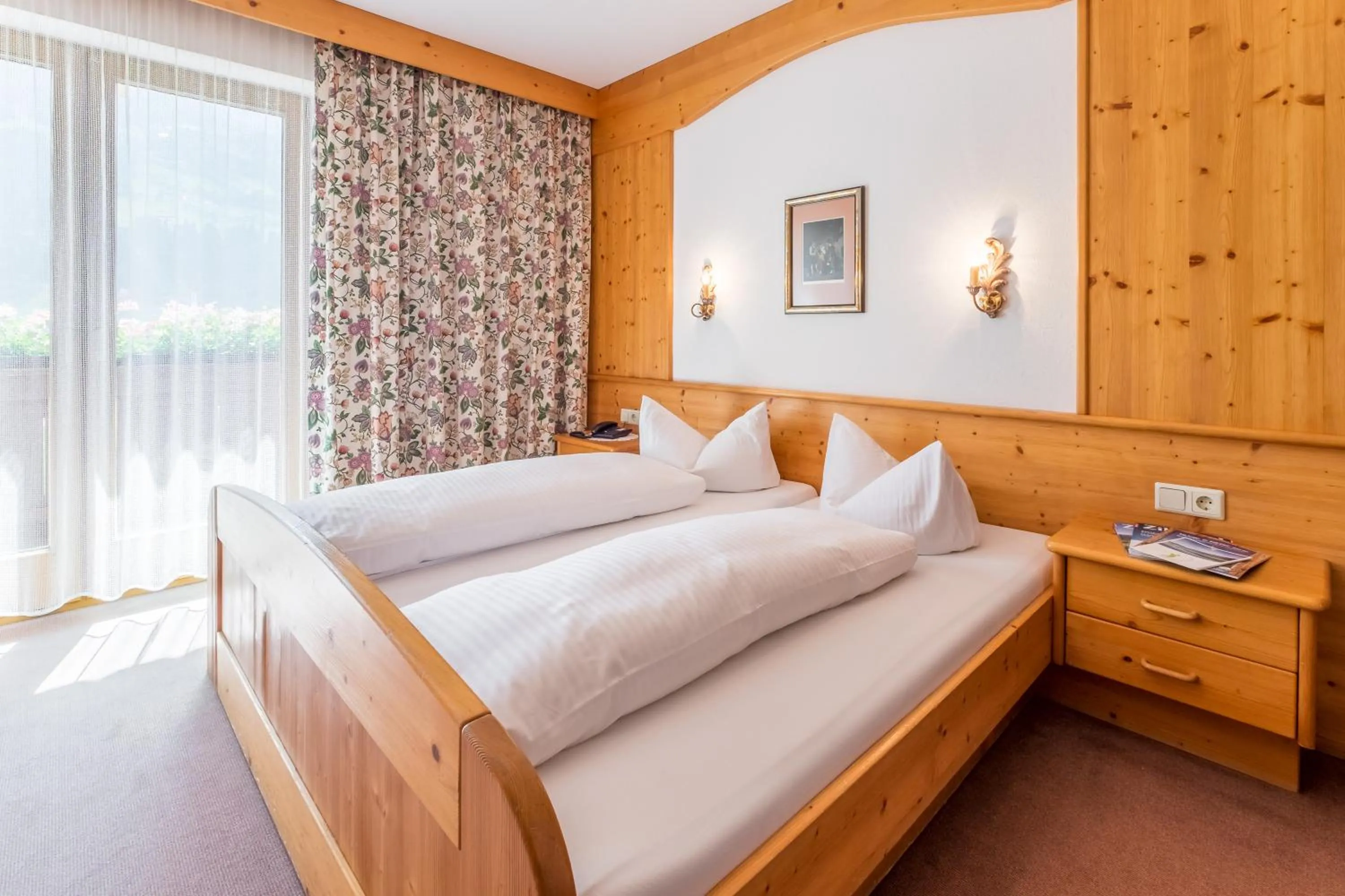 Photo of the whole room, Bed in Hotel Riedl im Zillertal