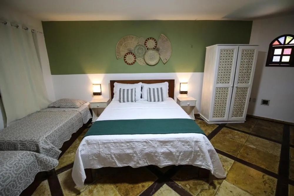 Bed in Pousada Tranquilandia Village