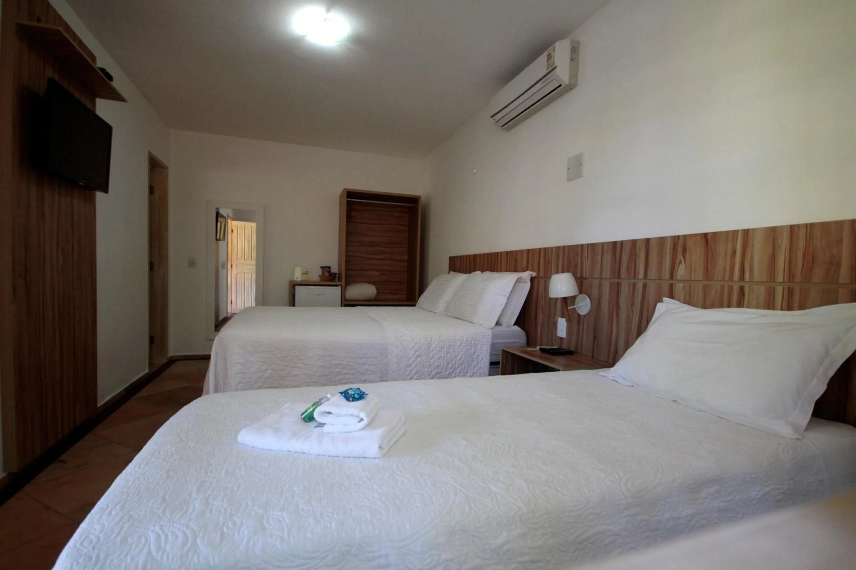 Bed in Pousada Tranquilandia Village