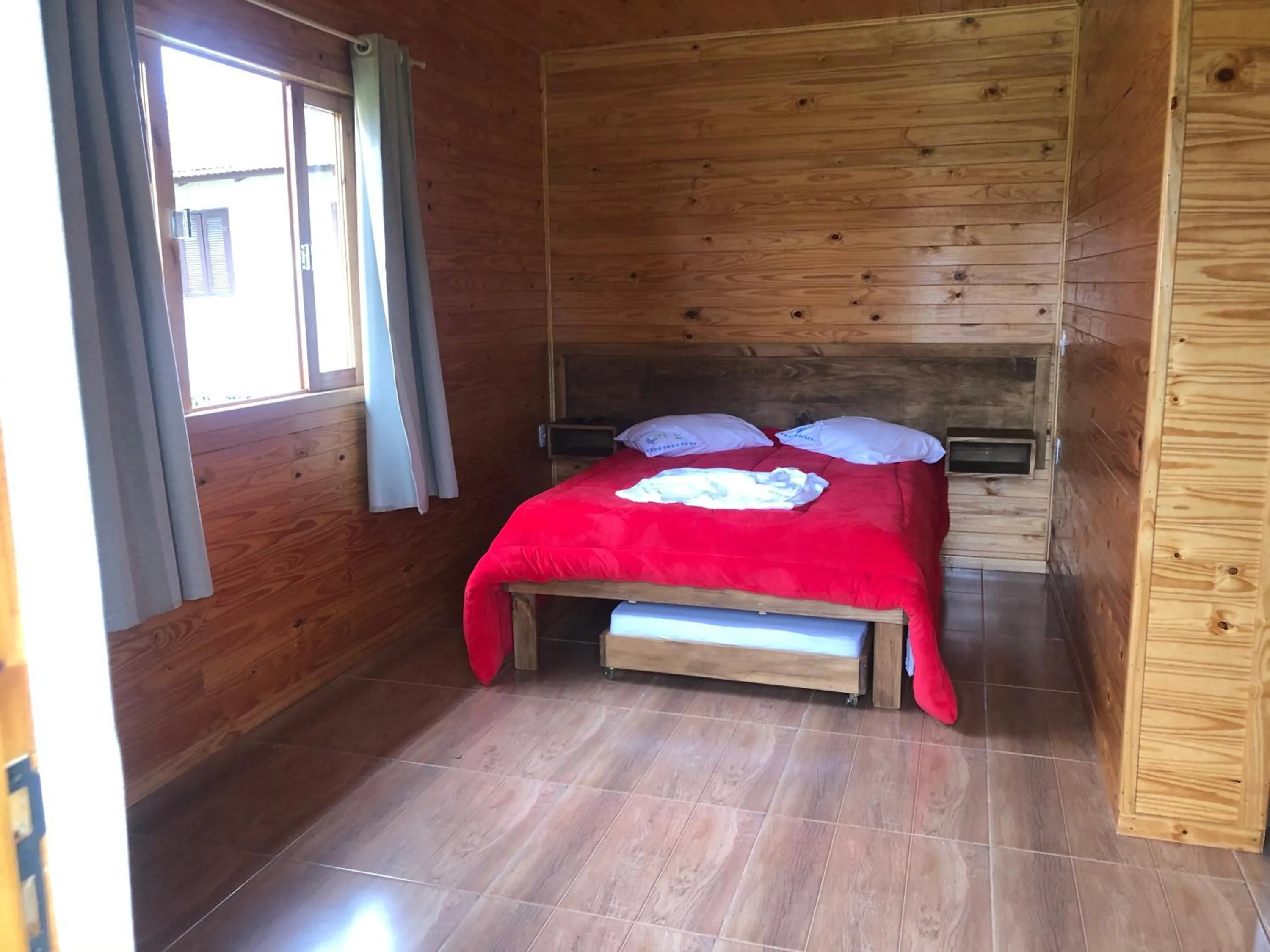 Bed in Pousada Santa Terezinha